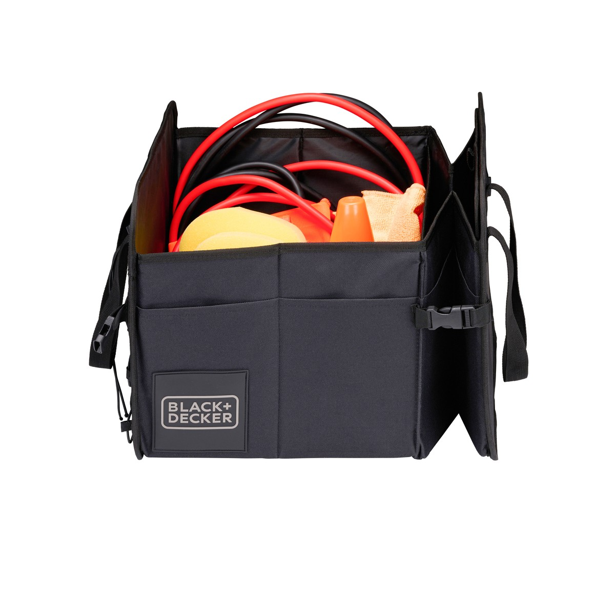 Black storage bag with red and black cables, yellow object, and orange cone.