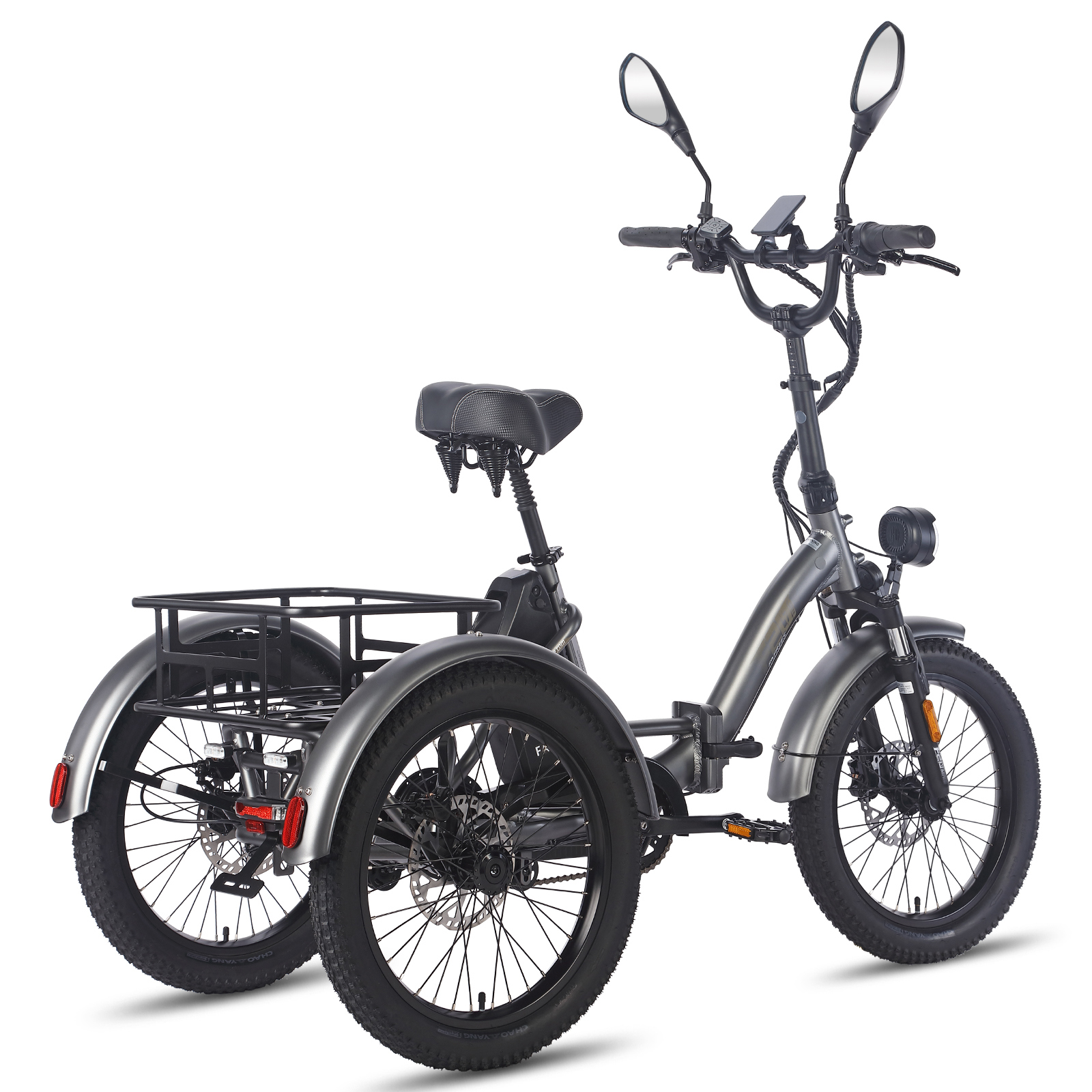 Triciclo gris con portaequipajes, asiento con suspensión y espejos.