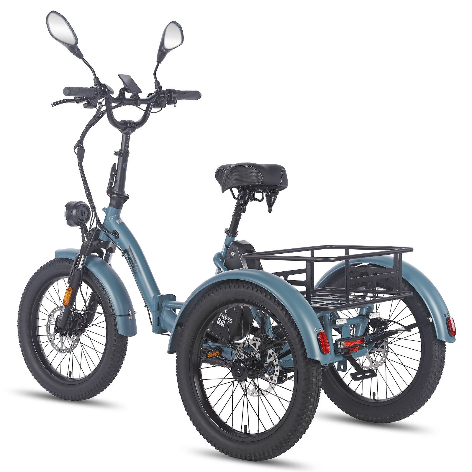 Una e-bike triciclo azul verdosa con llantas anchas, portaequipajes trasero y doble faro.