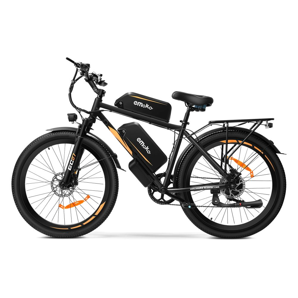 Bici elettrica nera con due batterie, accenti arancioni e portapacchi posteriore.