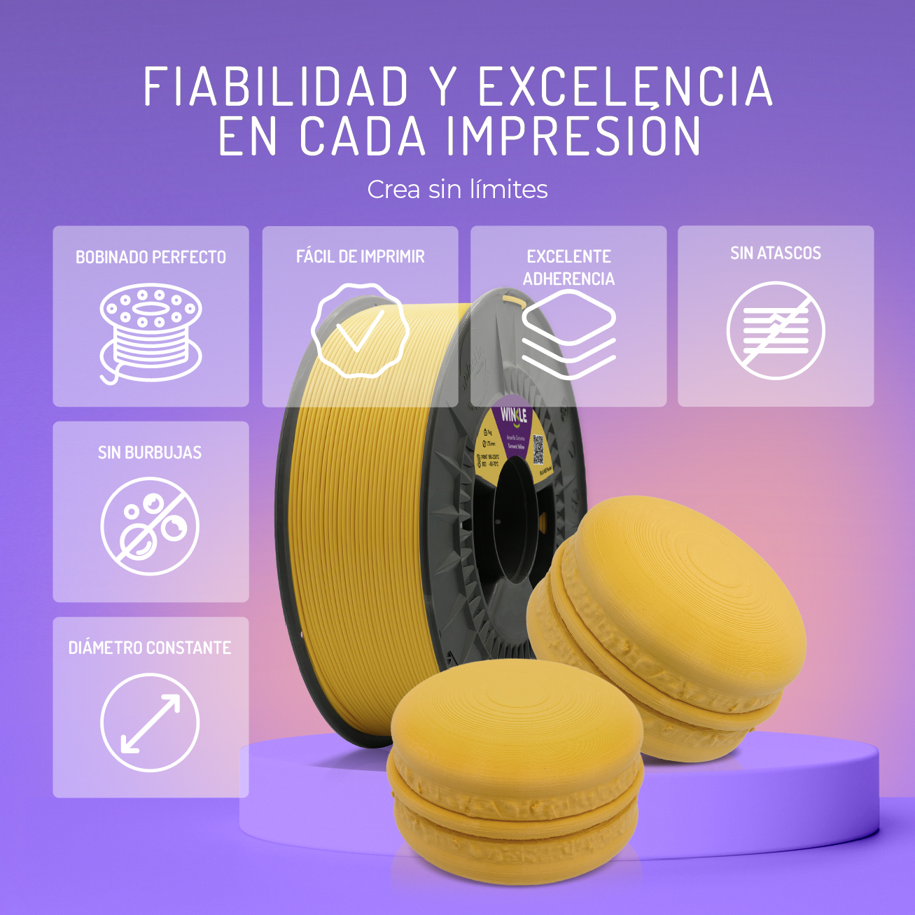 Un carrete de impresión 3D amarillo y dos objetos en forma de macaron.