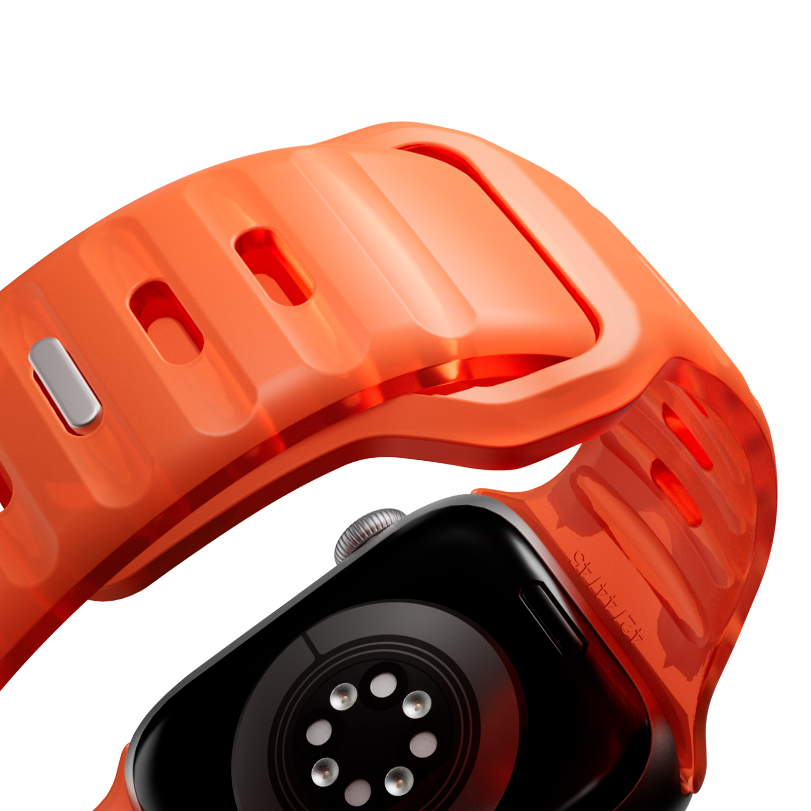 Correa de reloj naranja con ventilaciones y botón plateado, rodeando una esfera de reloj negra.