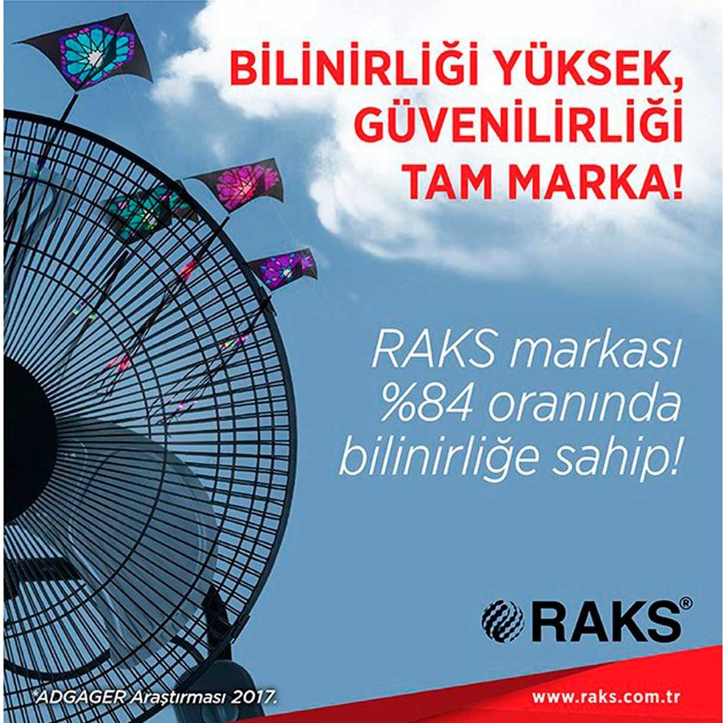 RAKS logosunun üzerindeki gökyüzünde renkli uçurtmalar olan bir vantilatör.