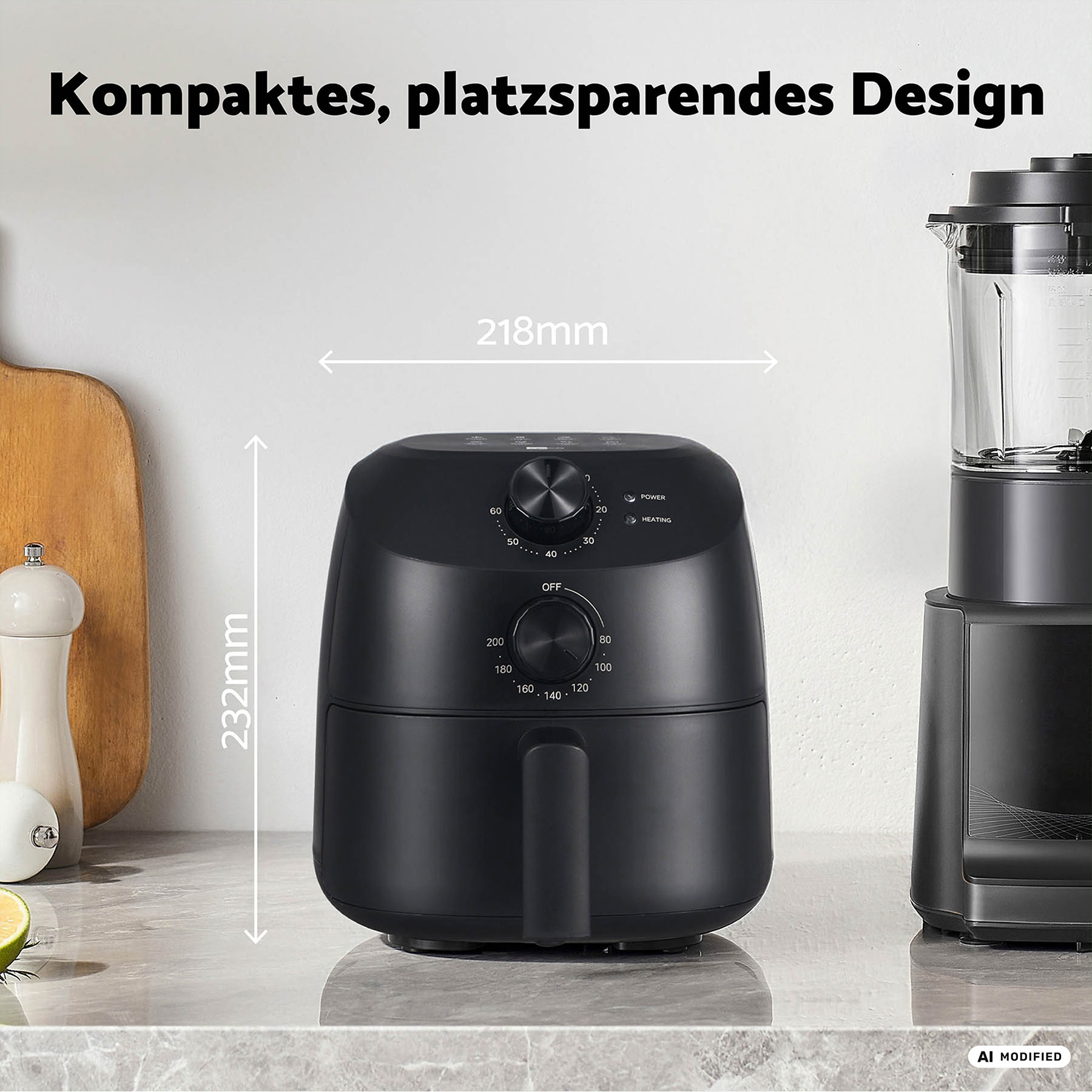 Schwarzer Luftfritteuse mit Temperaturregler auf einem Marmor-Arbeitsplatte.