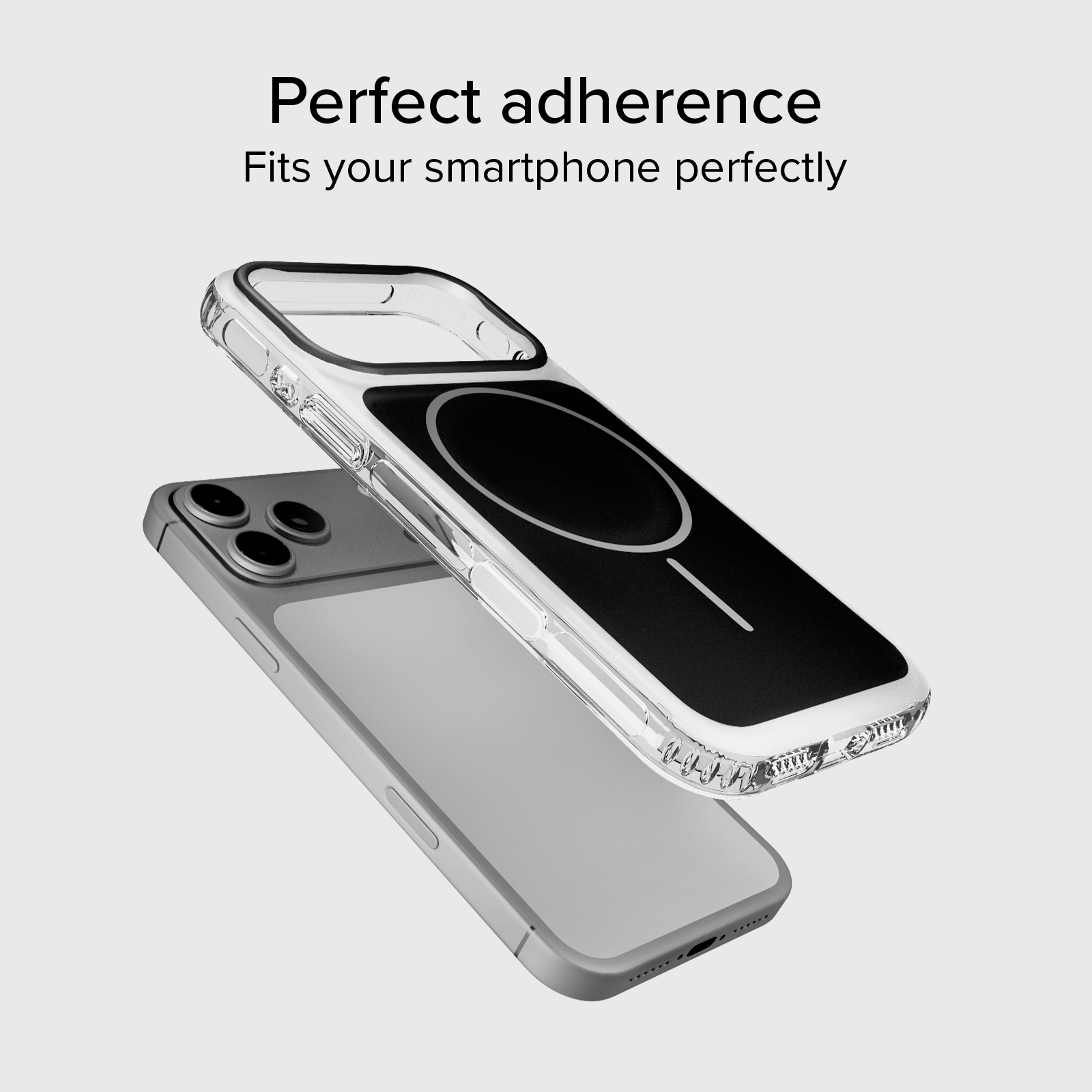 Una funda transparente para teléfono con anillo magnético negro flota sobre un smartphone plateado.
