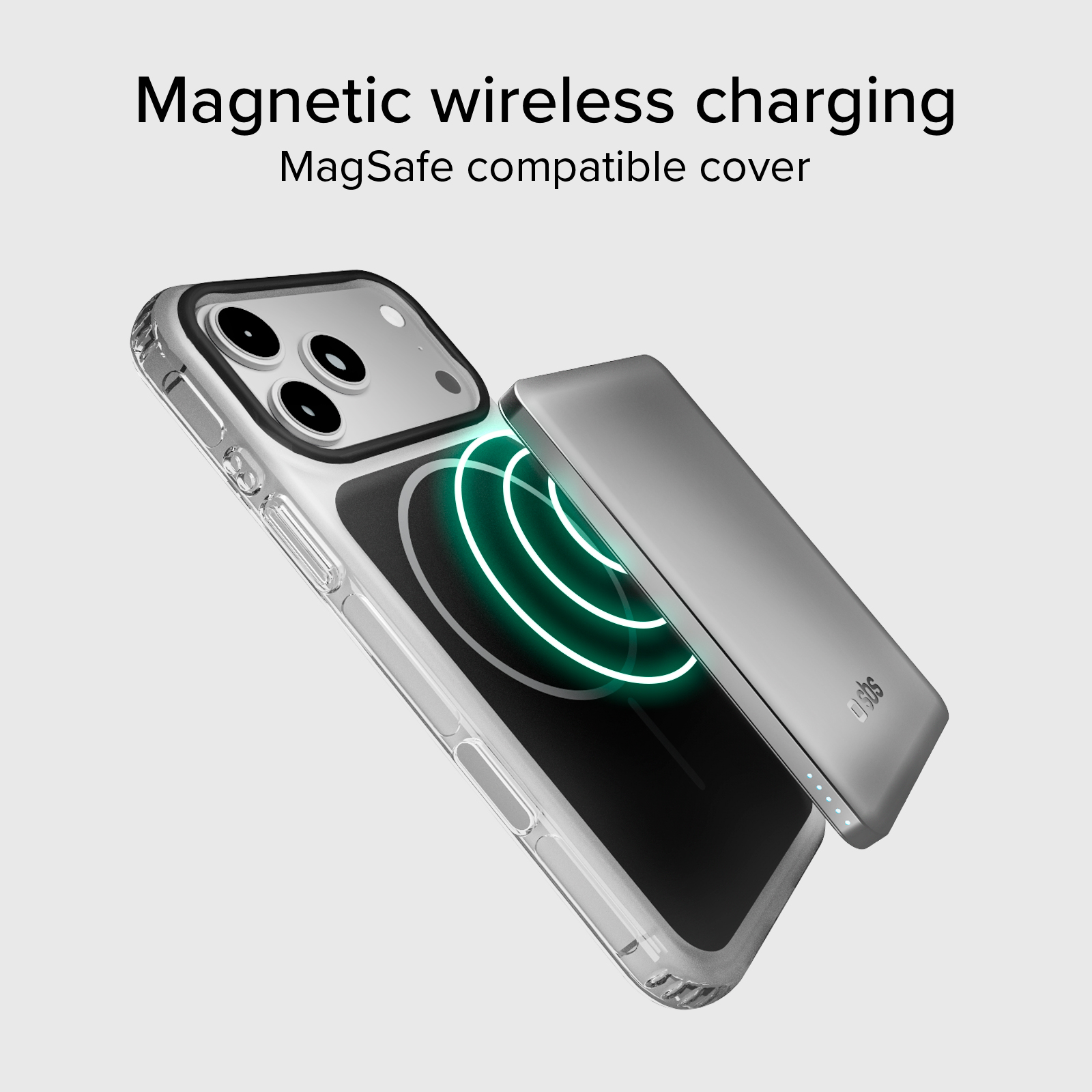 Una funda transparente para teléfono carga inalámbricamente en un cargador gris.