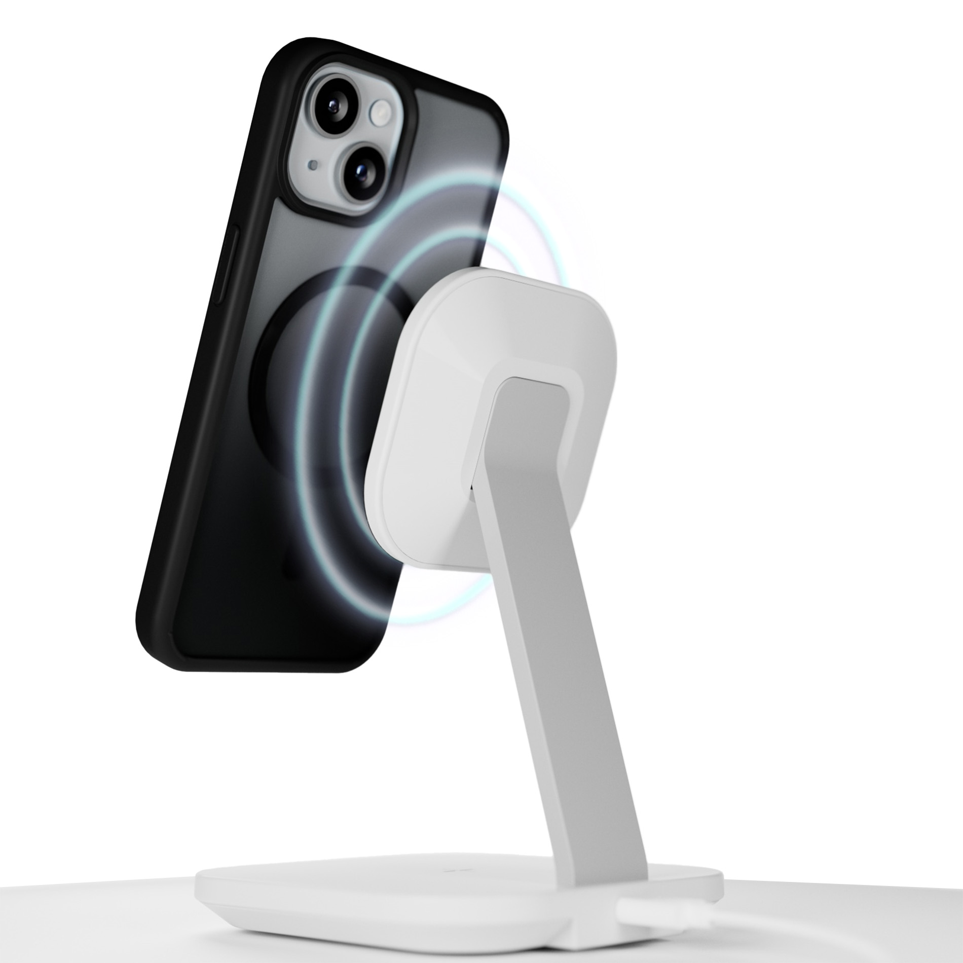 Smartphone nero con funzione di ricarica su supporto bianco con anelli blu.