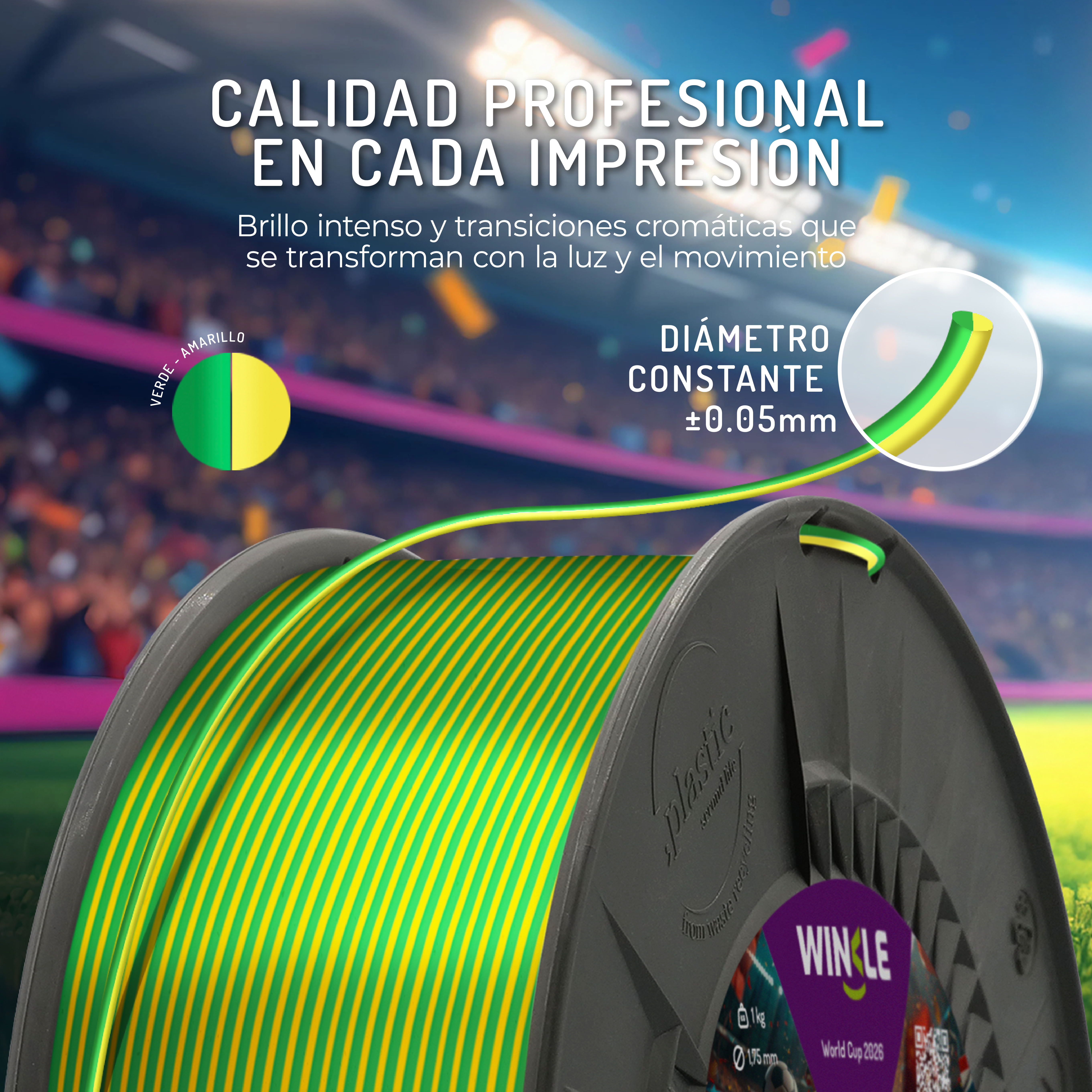 Un carrete de filamento verde y amarillo, con fondo de estadio desenfocado.