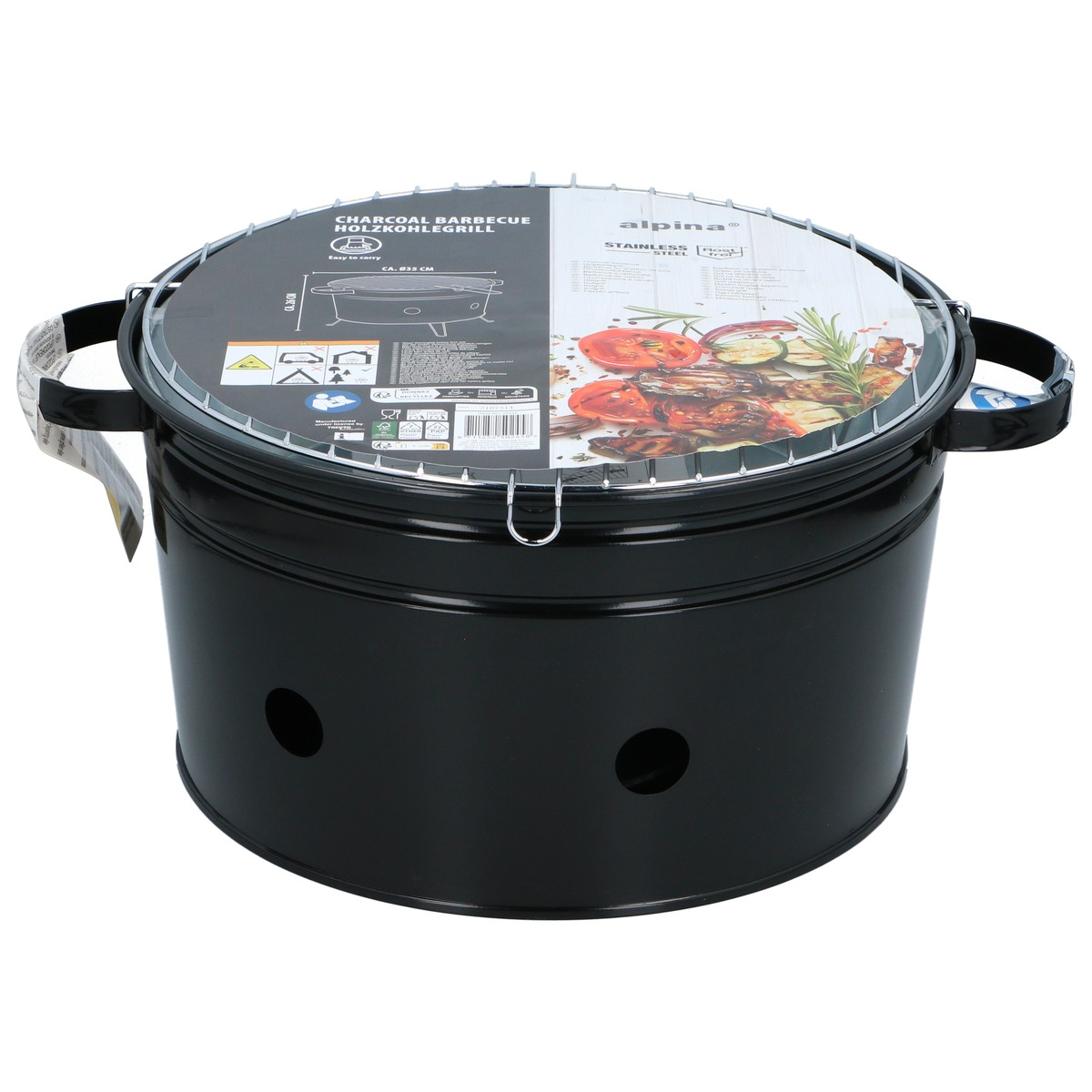 A black charcoal grill with a silver grate and handles. A label is on top.
