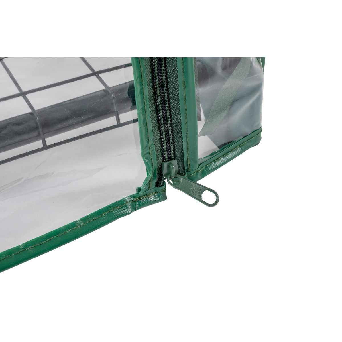 A green zipper on a clear greenhouse with a black grid.