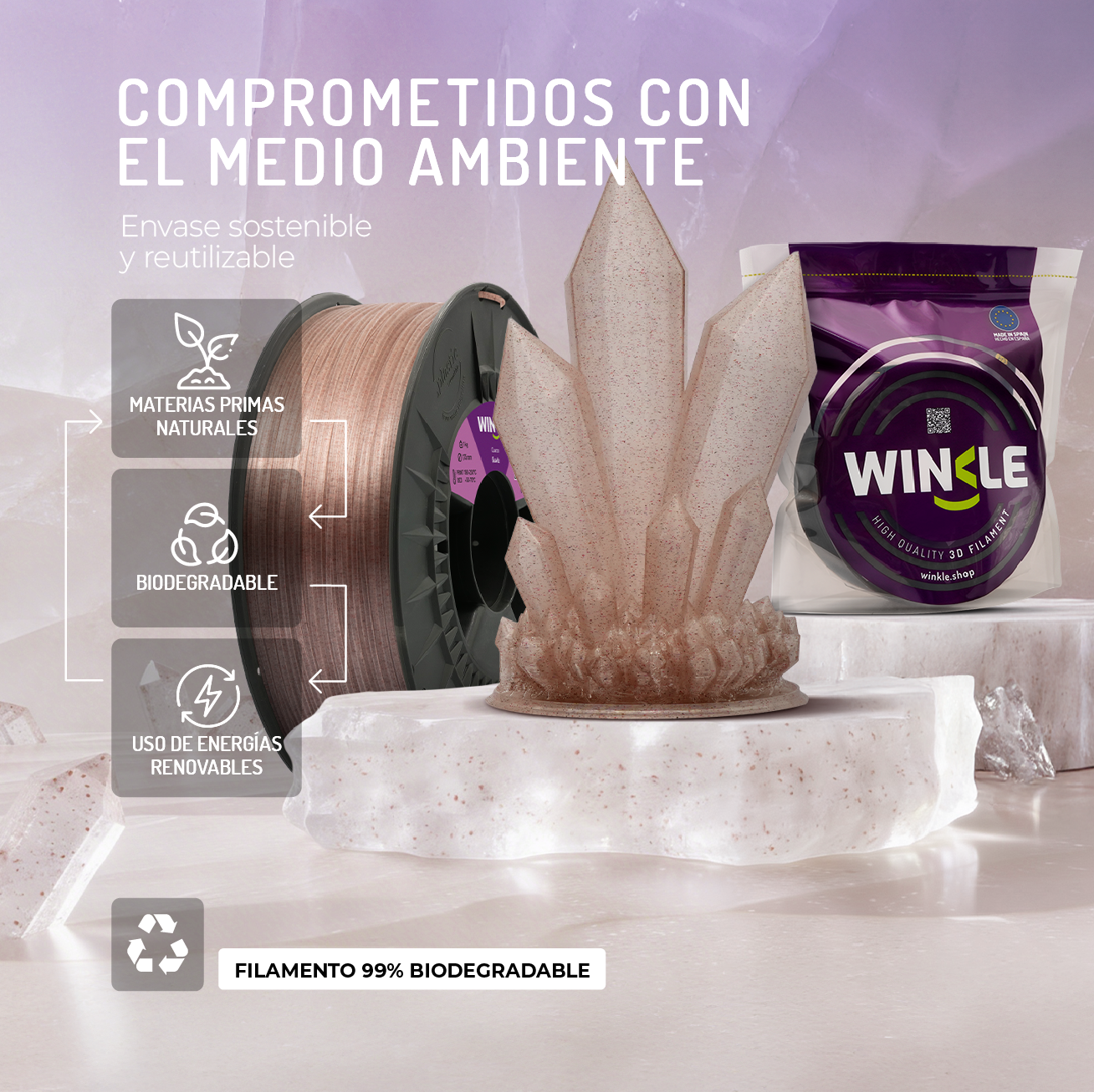 Bobina de filamento de impresión 3D, escultura de cristal y embalaje sobre bases de mármol.