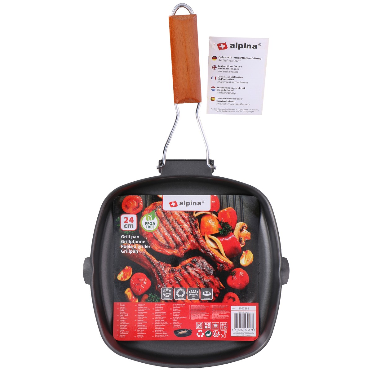 Una sartén grill negra con mango de madera y etiqueta con carne y verduras.