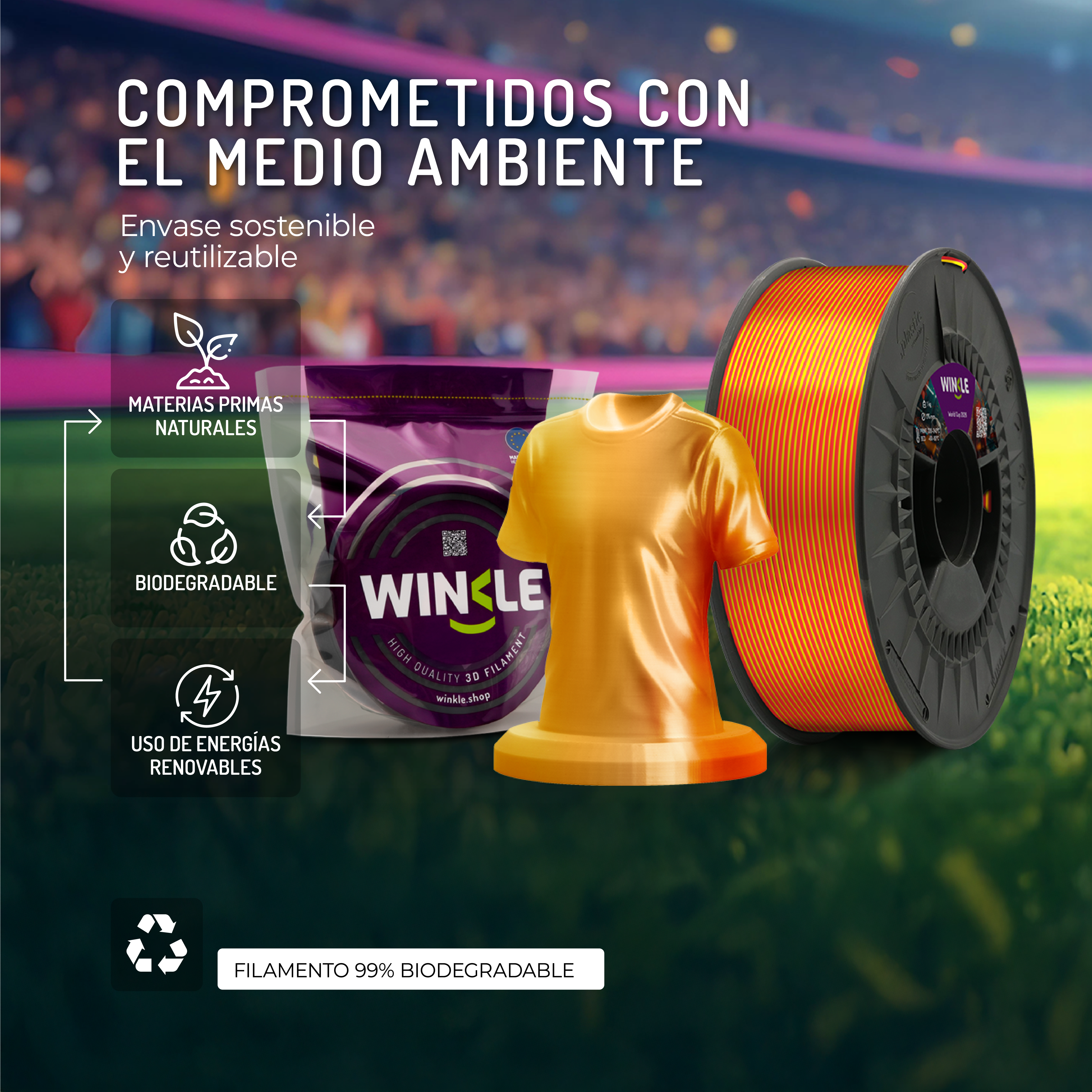 Bobina de filamento naranja para impresión 3D junto a un modelo de camiseta naranja.