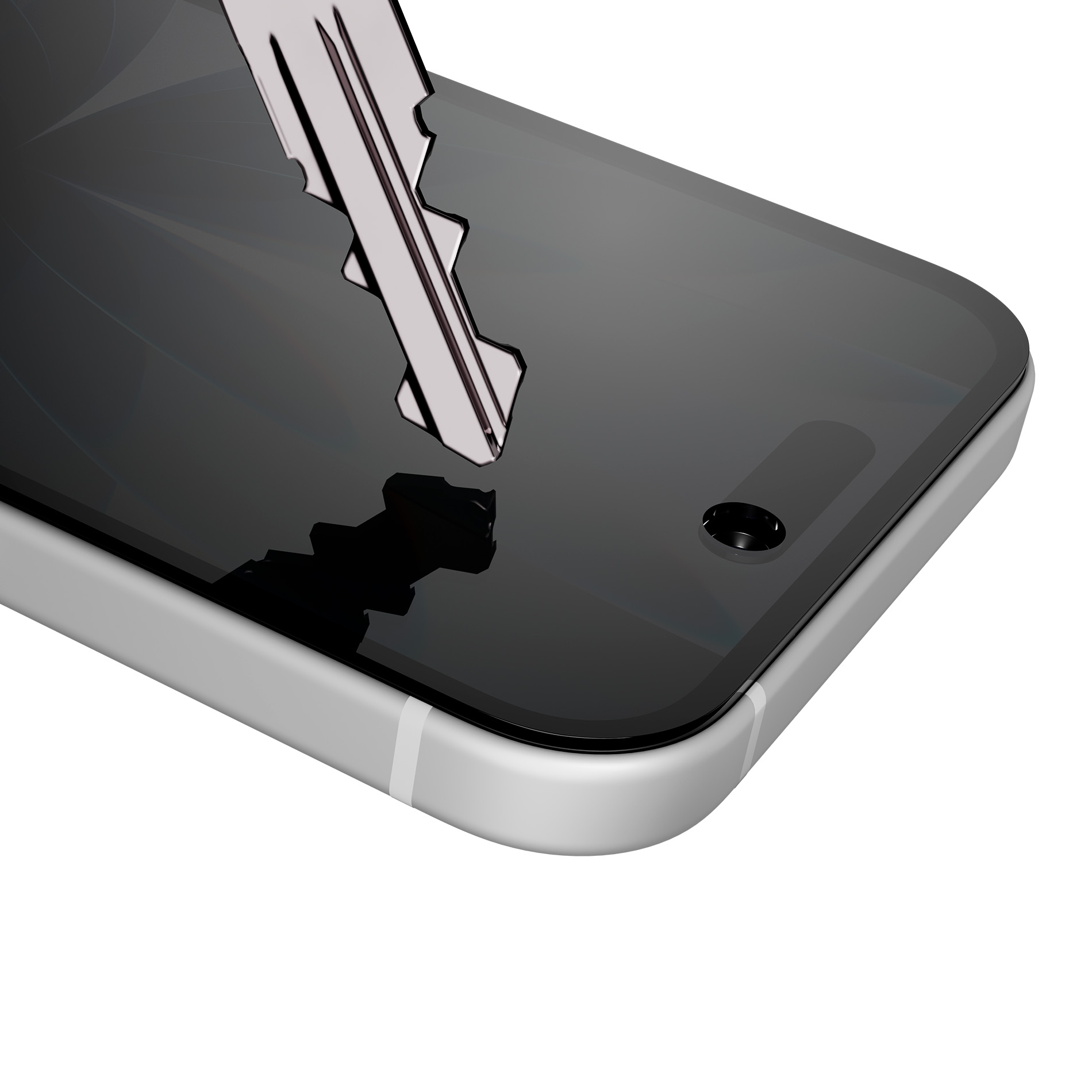 Una llave plateada yace sobre una pantalla oscura de smartphone.