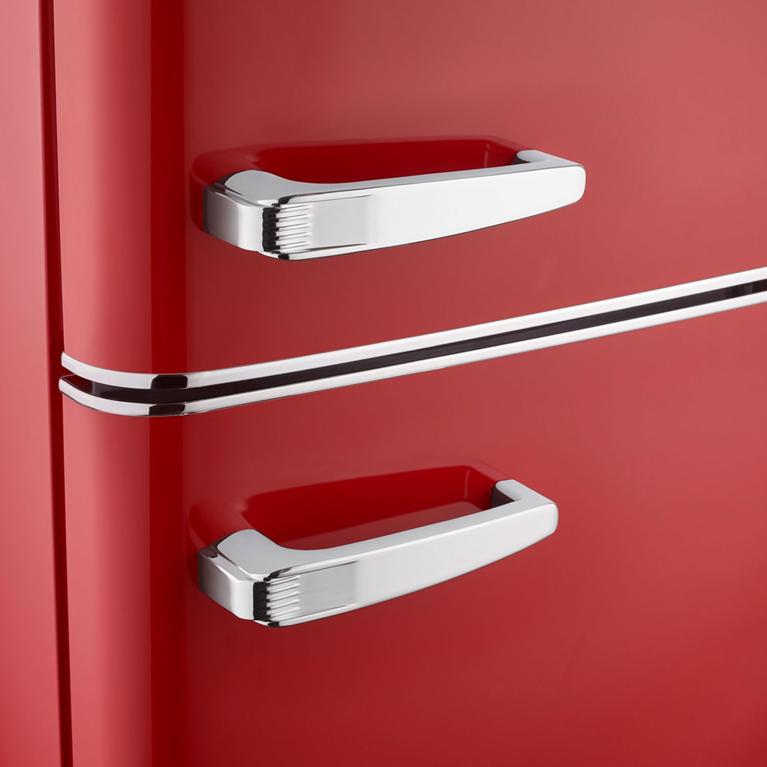Two red refrigerator doors with chrome handles and a chrome stripe.
