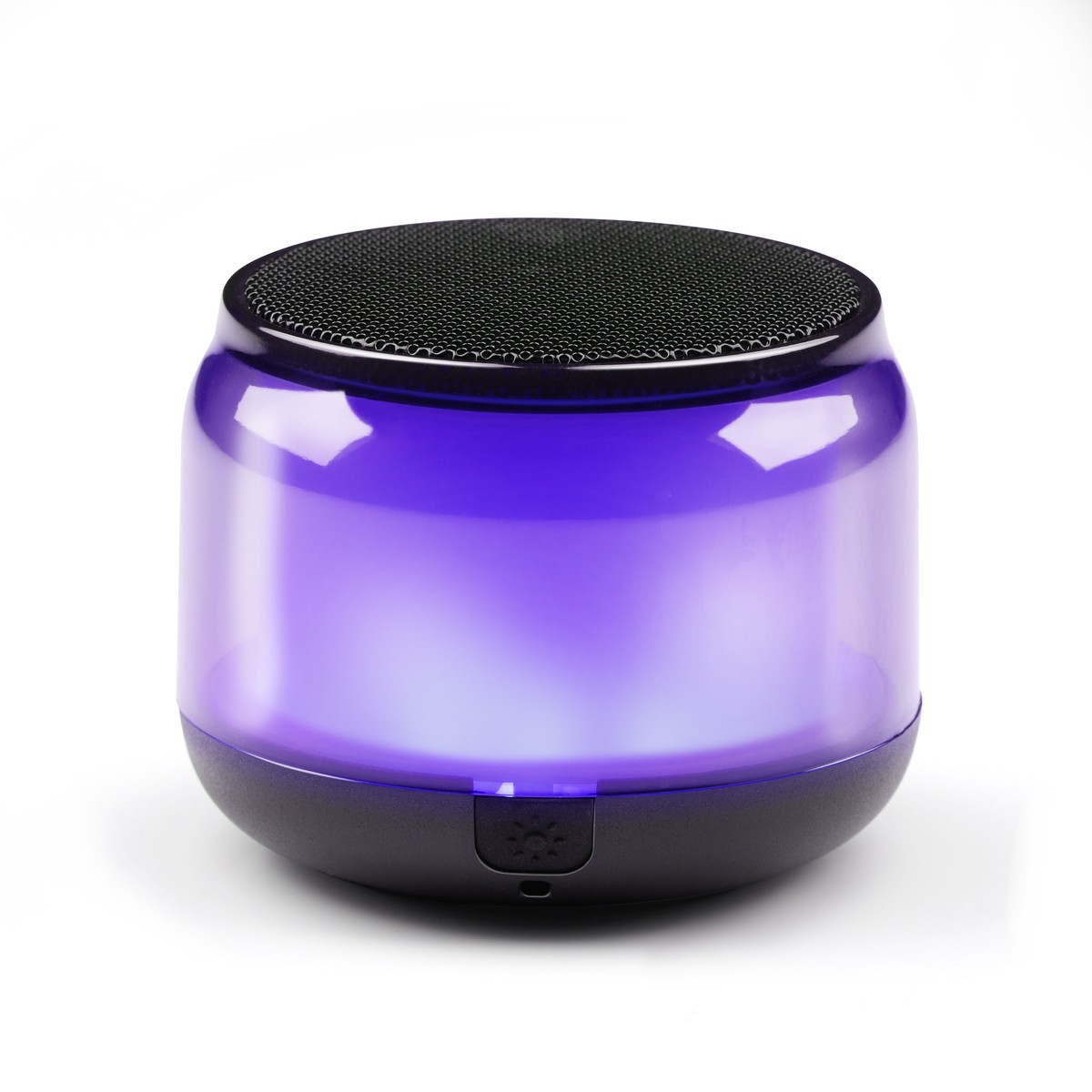 A round, portable speaker with a black mesh top and a translucent purple body glows.