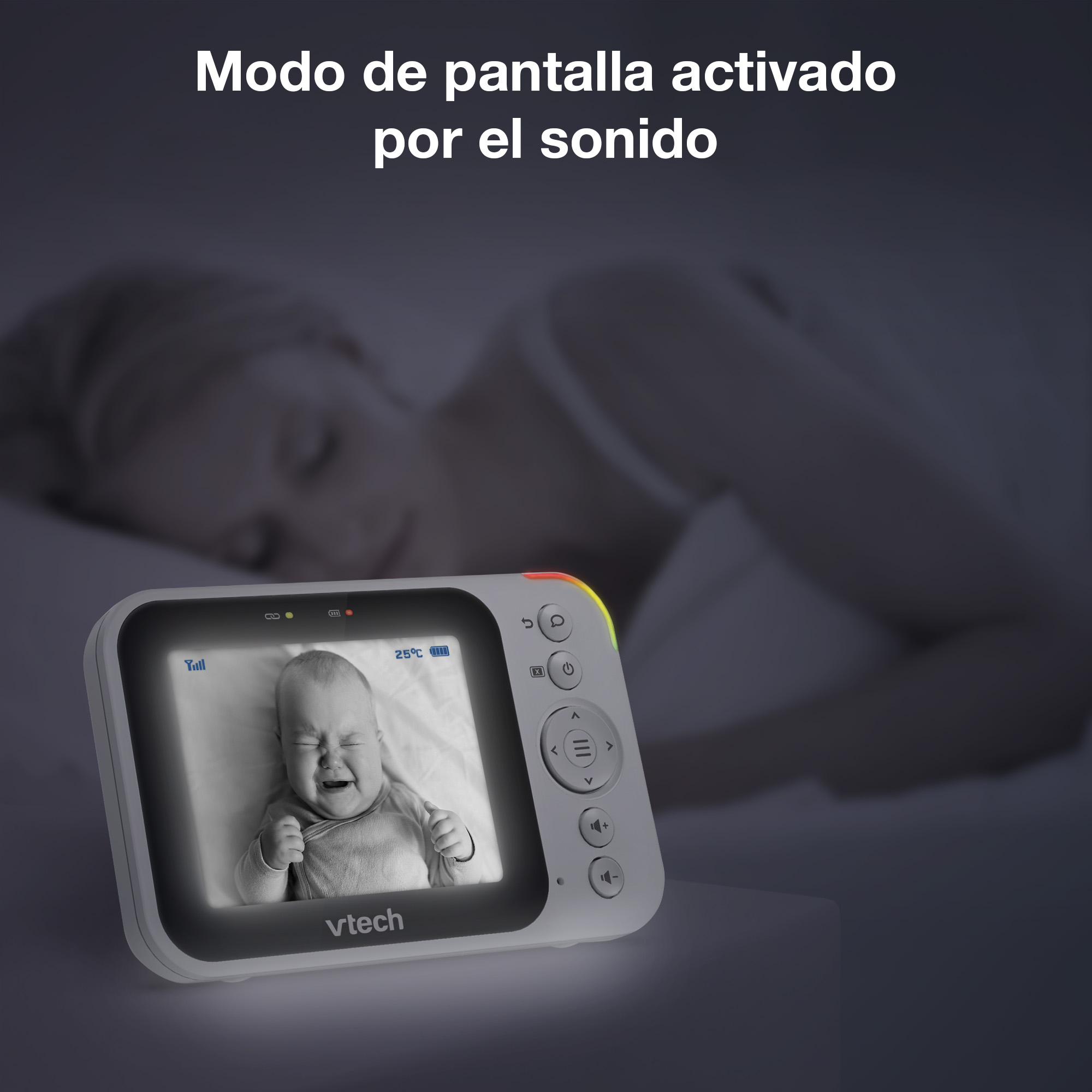 Un vigilabebés muestra un bebé llorando; una mujer duerme al fondo.