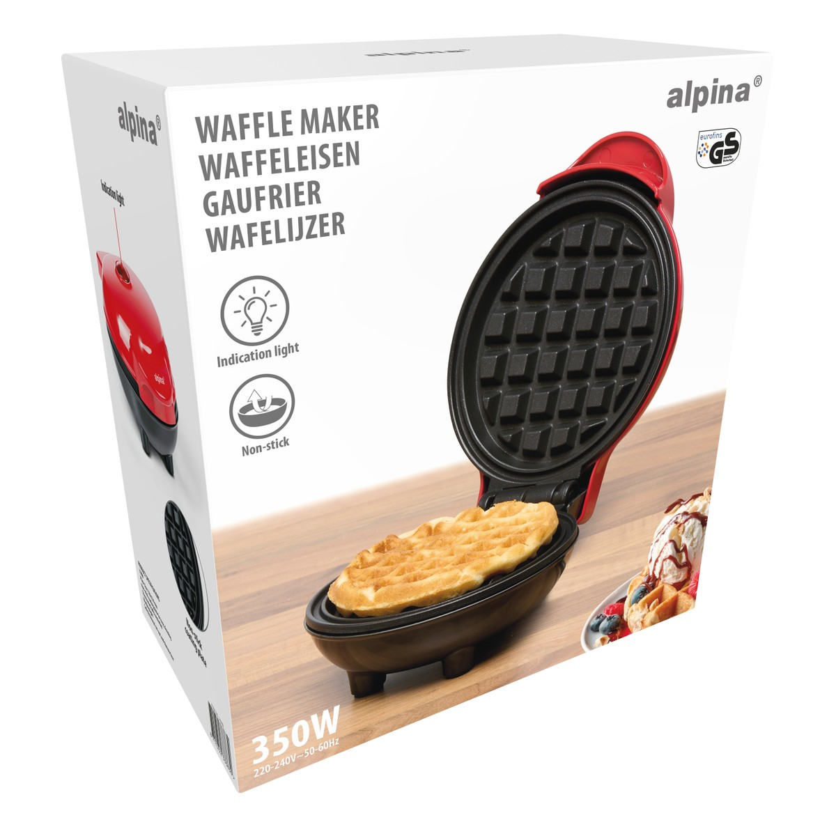 Red waffle maker with a waffle and ice cream next to it.