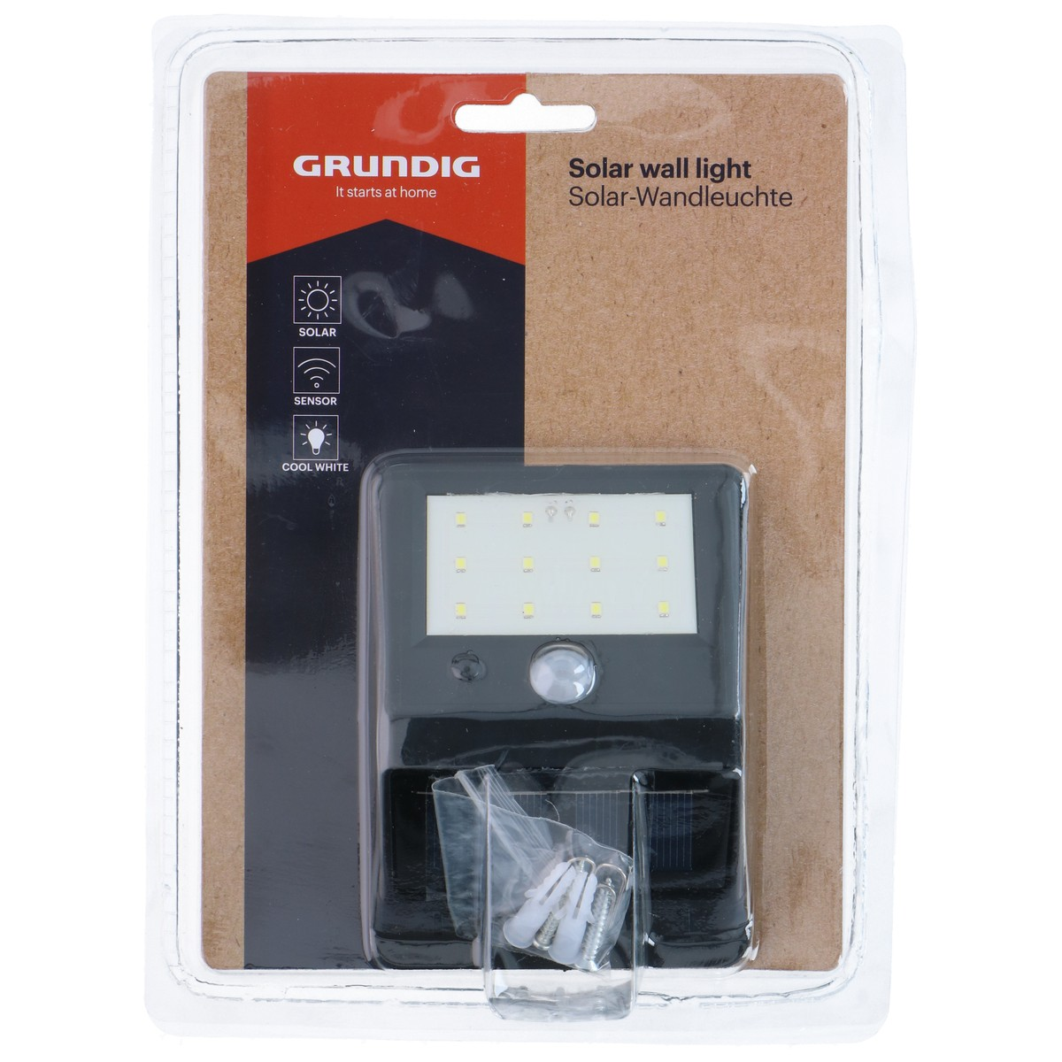 Solar wall light in packaging with screws and plugs.