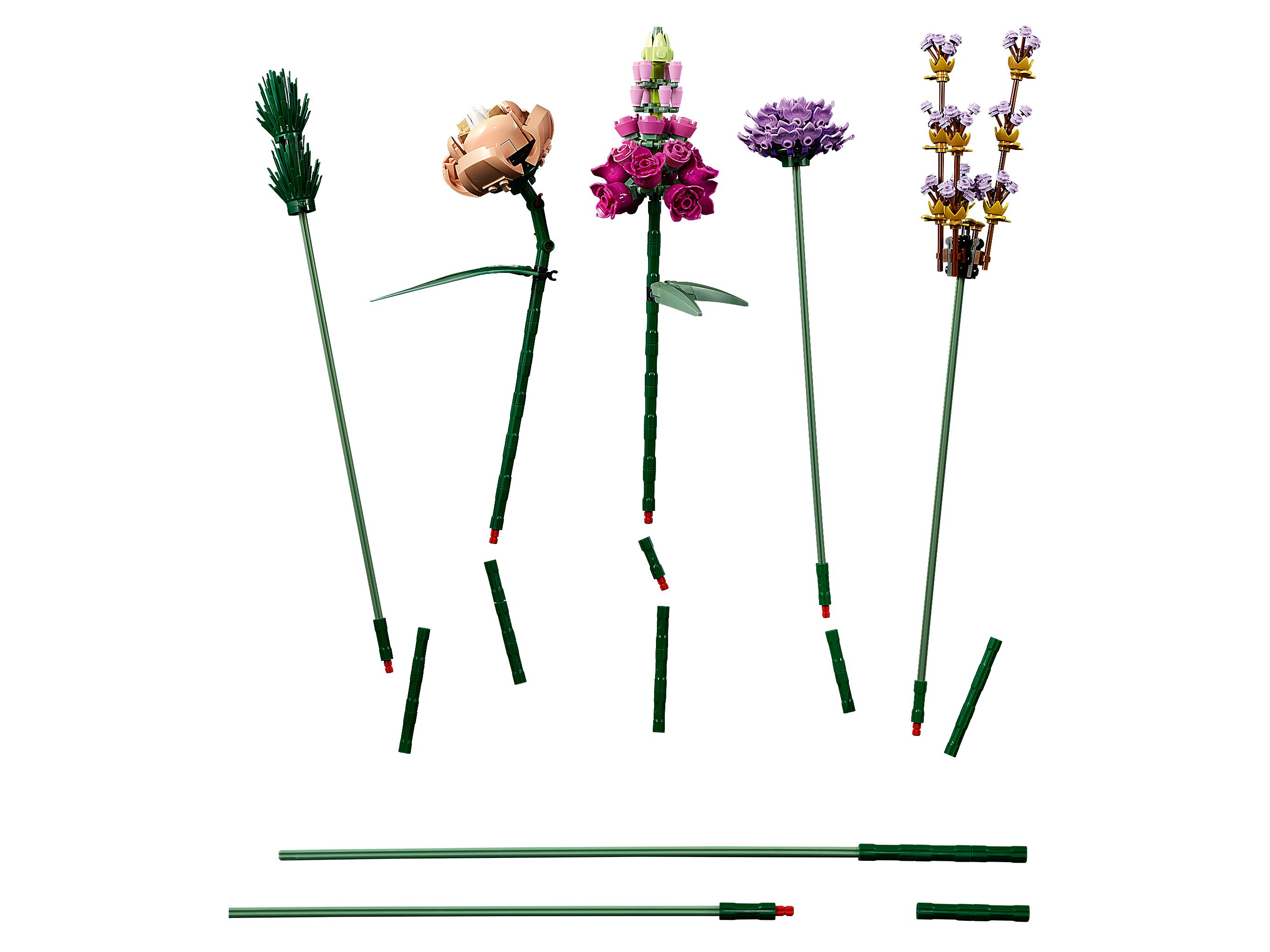 Five LEGO flower models and stems on a white background.