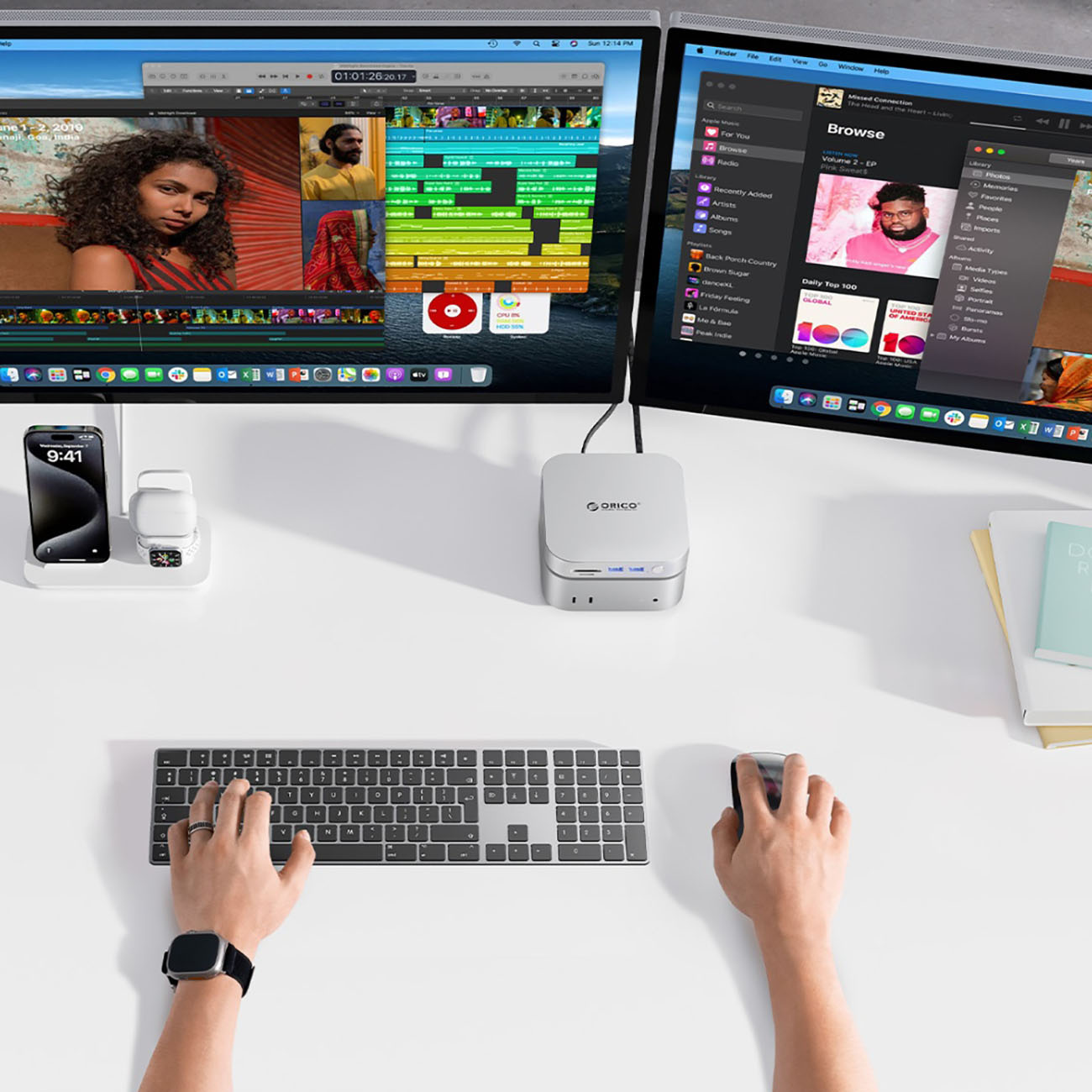 Dwa monitory, klawiatura, mysz, smartfon, smartwatch i hub na biurku.