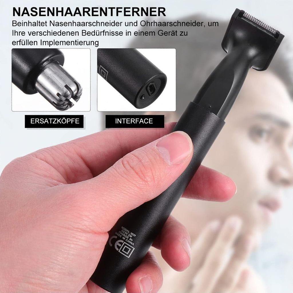 Ein Mann hält einen schwarzen Nasen- und Ohrhaartrimmer. Nahaufnahme.