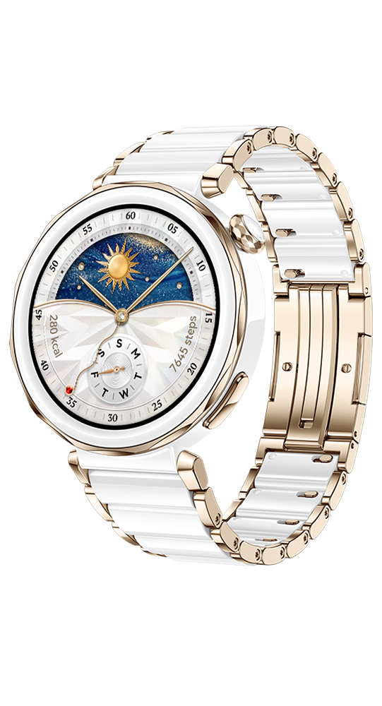 White ceramic and gold smartwatch with a sun and stars watch face.