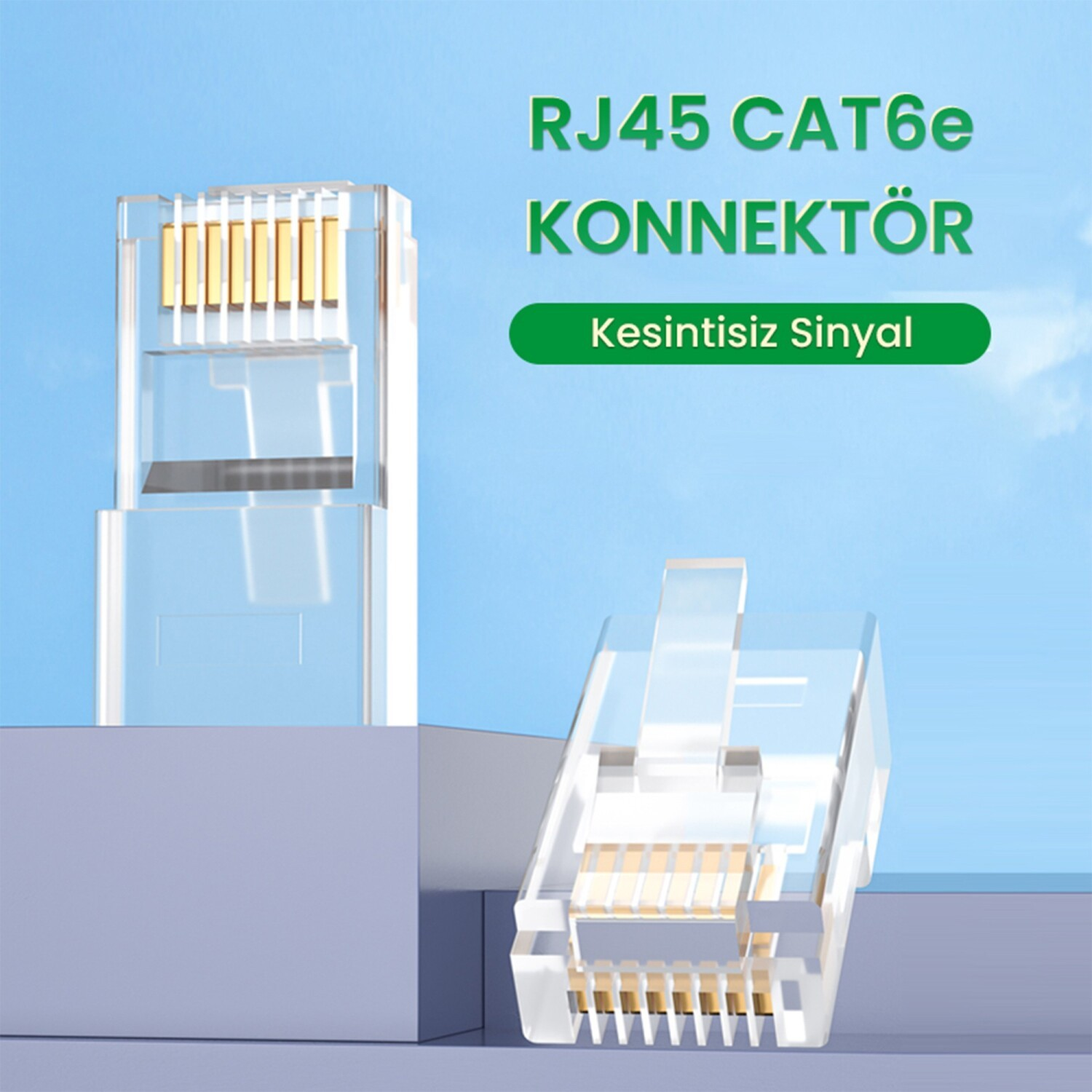 Altın pinli iki şeffaf RJ45 CAT6e konnektör, açık mavi arka plan üzerinde.