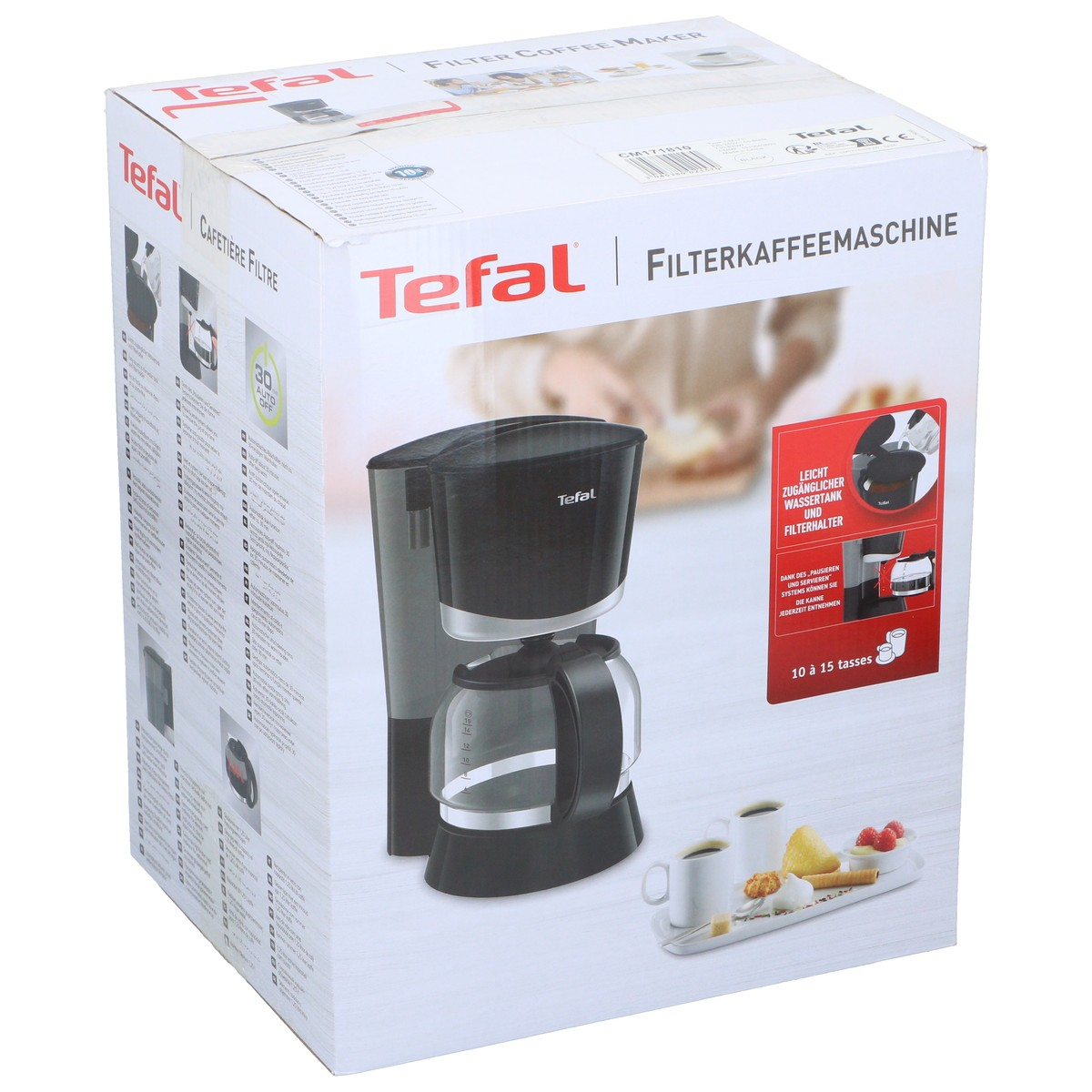Box of a black Tefal filter coffee maker with accessories and cups.