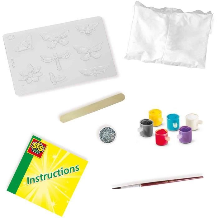 Kit creativo con stampi, colori, pennello e istruzioni.
