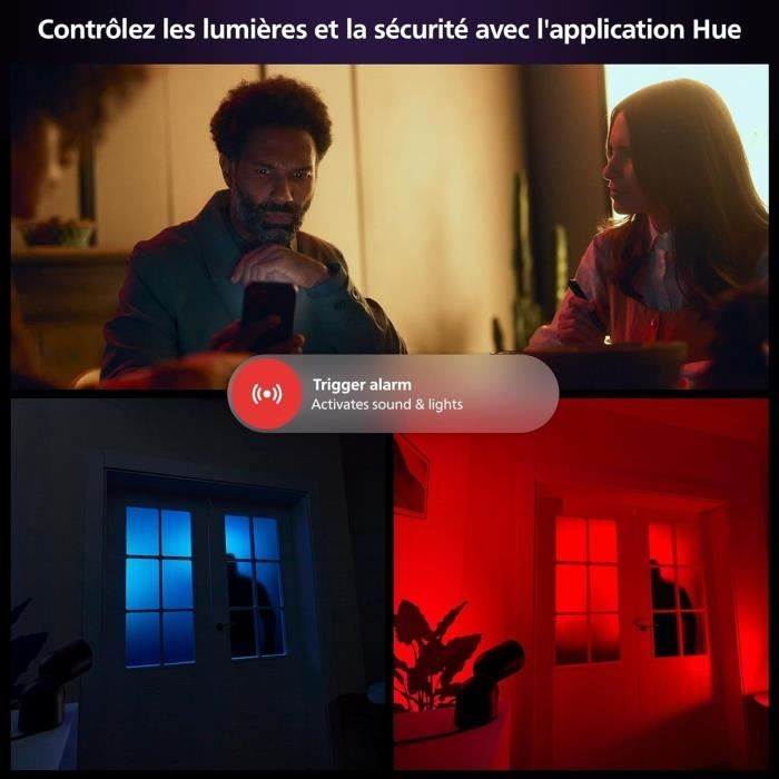 Uomo e donna guardano telefono. Porta con luce blu e rossa.