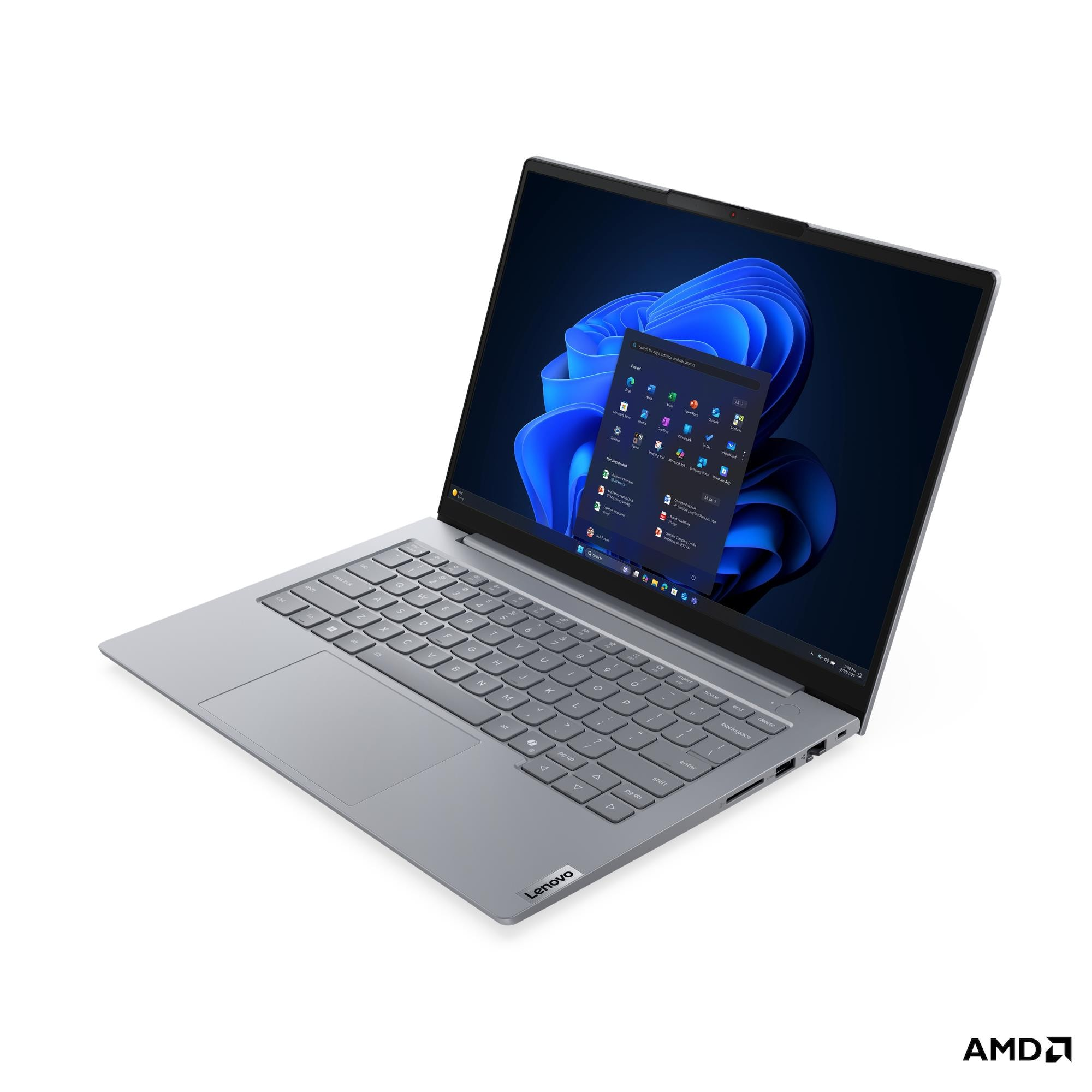 Un laptop Lenovo argentato chiuso con Windows 11 e logo AMD.