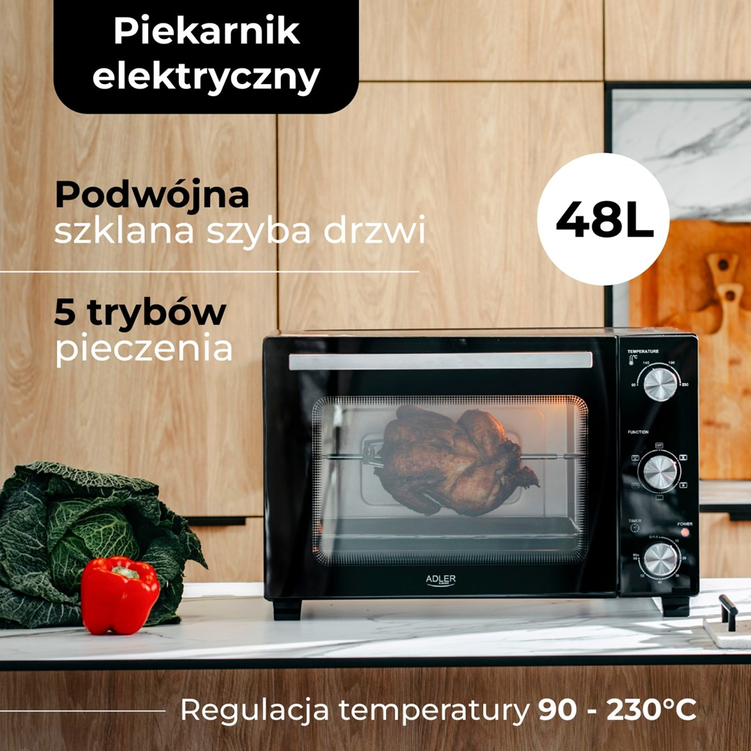 Elektryczny piekarnik 48L piekący kurczaka, z kapustą i papryką.