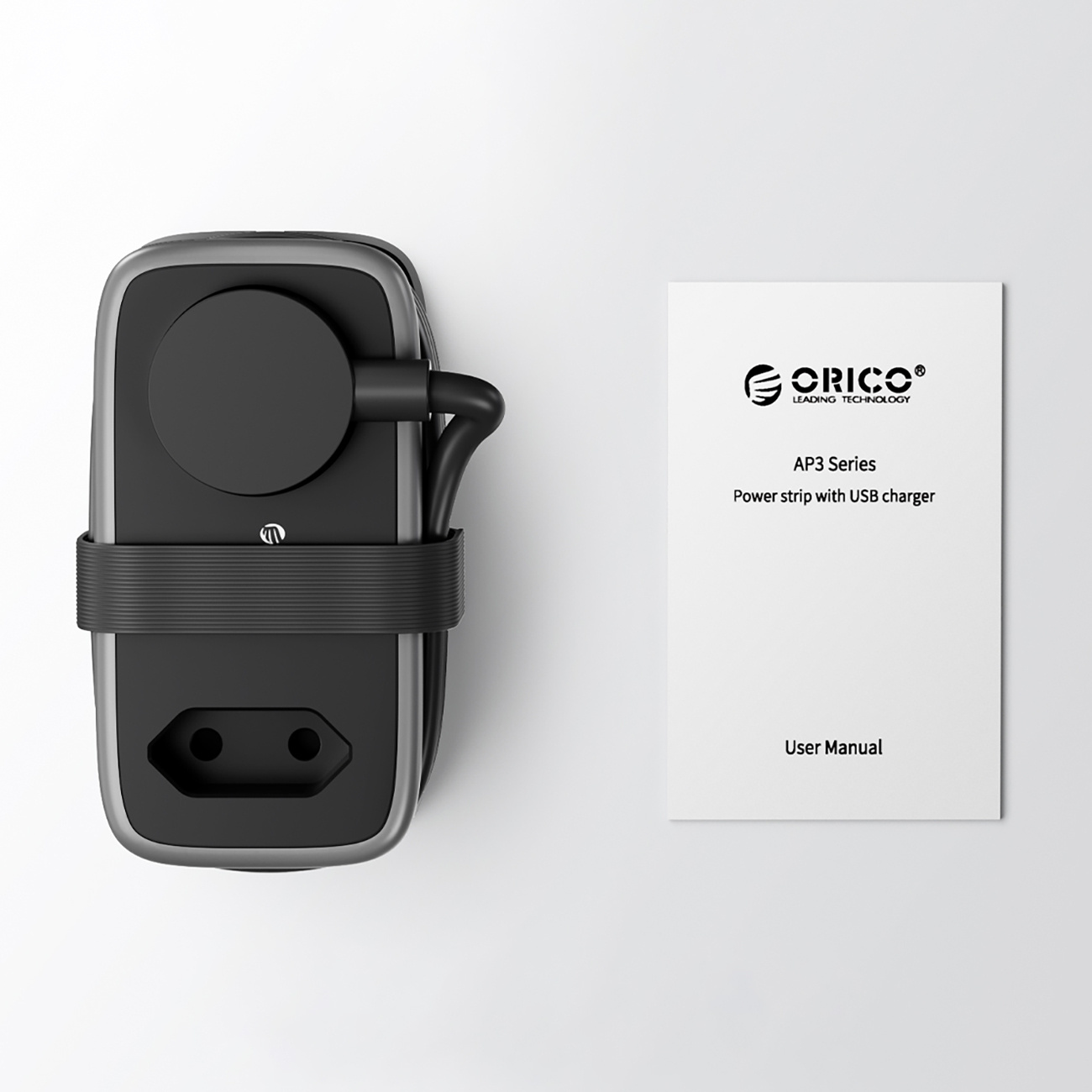 Czarna listwa zasilająca ORICO AP3 Series z ładowarką USB i instrukcją.