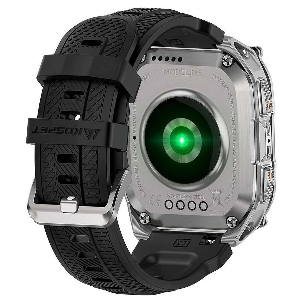 Retro di uno smartwatch con cinturino nero, sensore verde e cassa argentata.