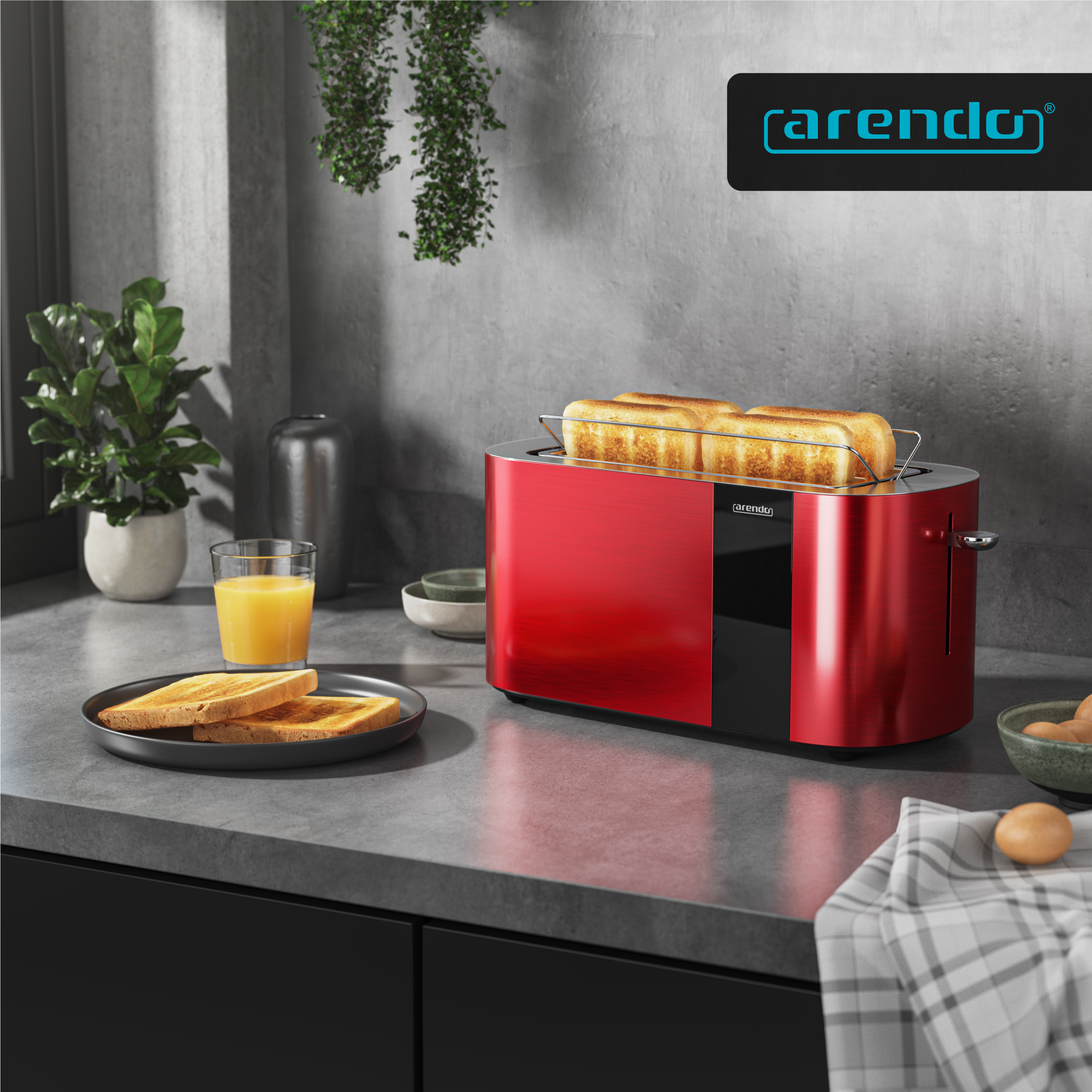 Roter Toaster mit Toast, Saft und Eiern auf einer Küchenarbeitsplatte.