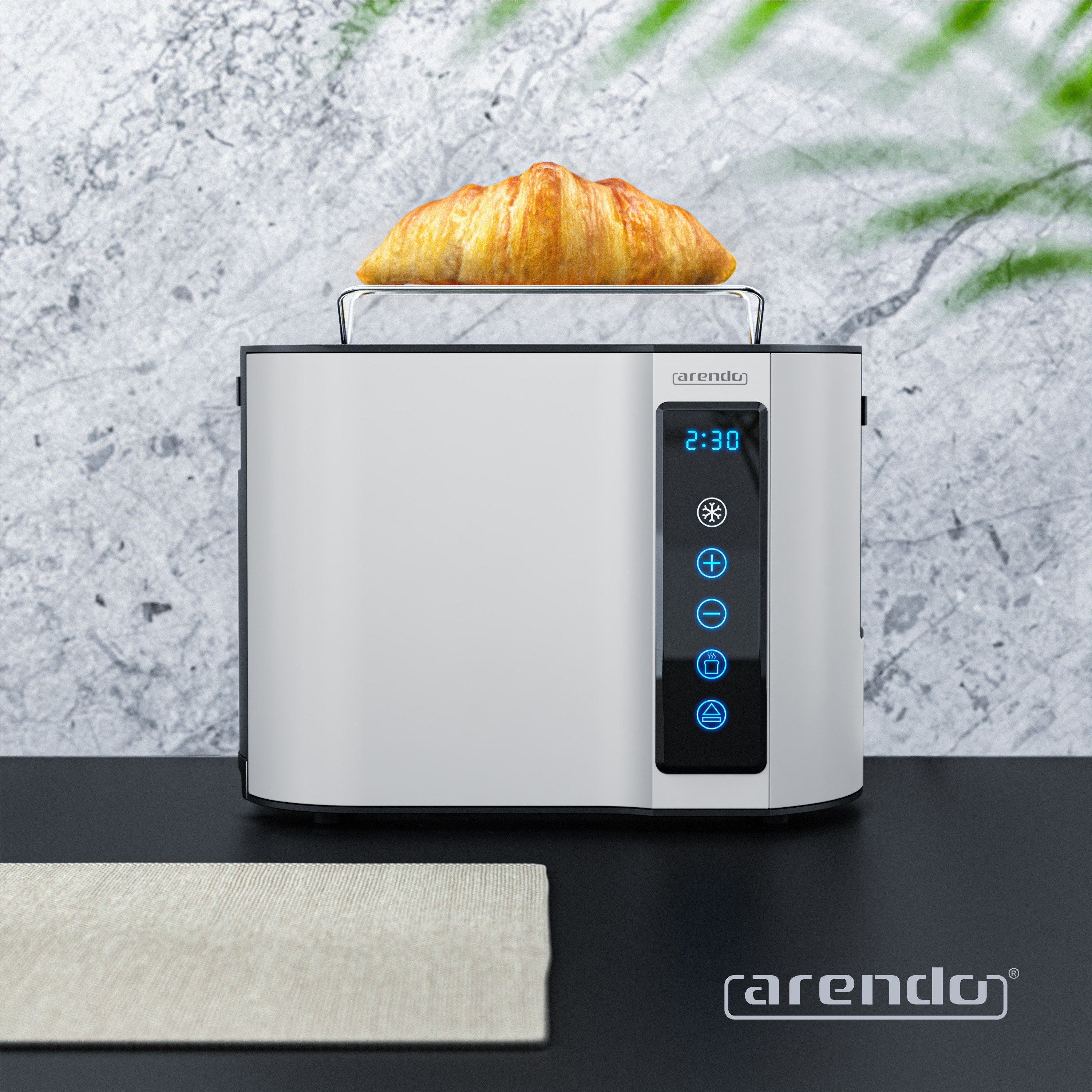 Ein silberner Toaster mit einem Croissant oben drauf, digitale Anzeige zeigt 2:30.