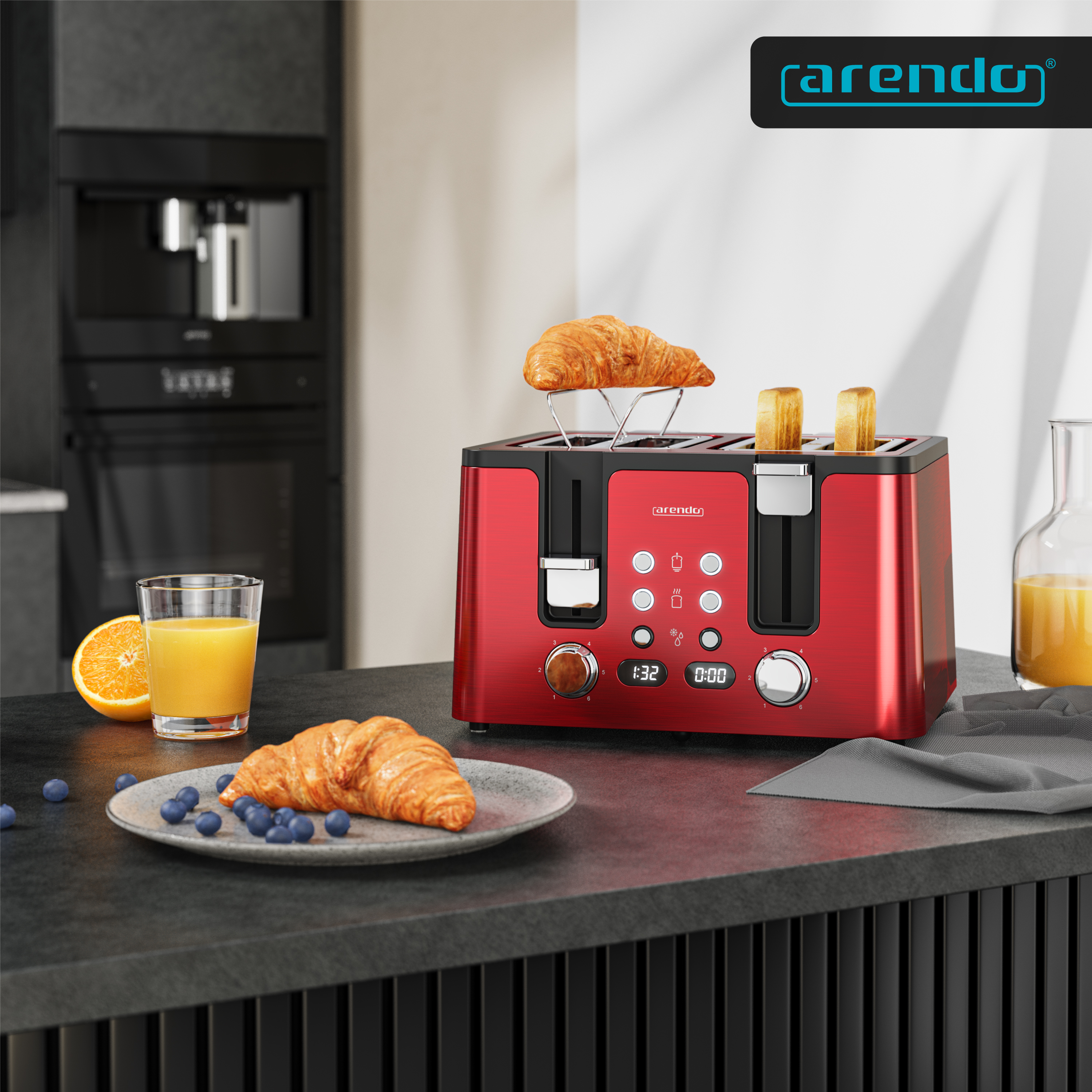 Roter Toaster mit Croissants und Orangensaft auf Küchentheke.