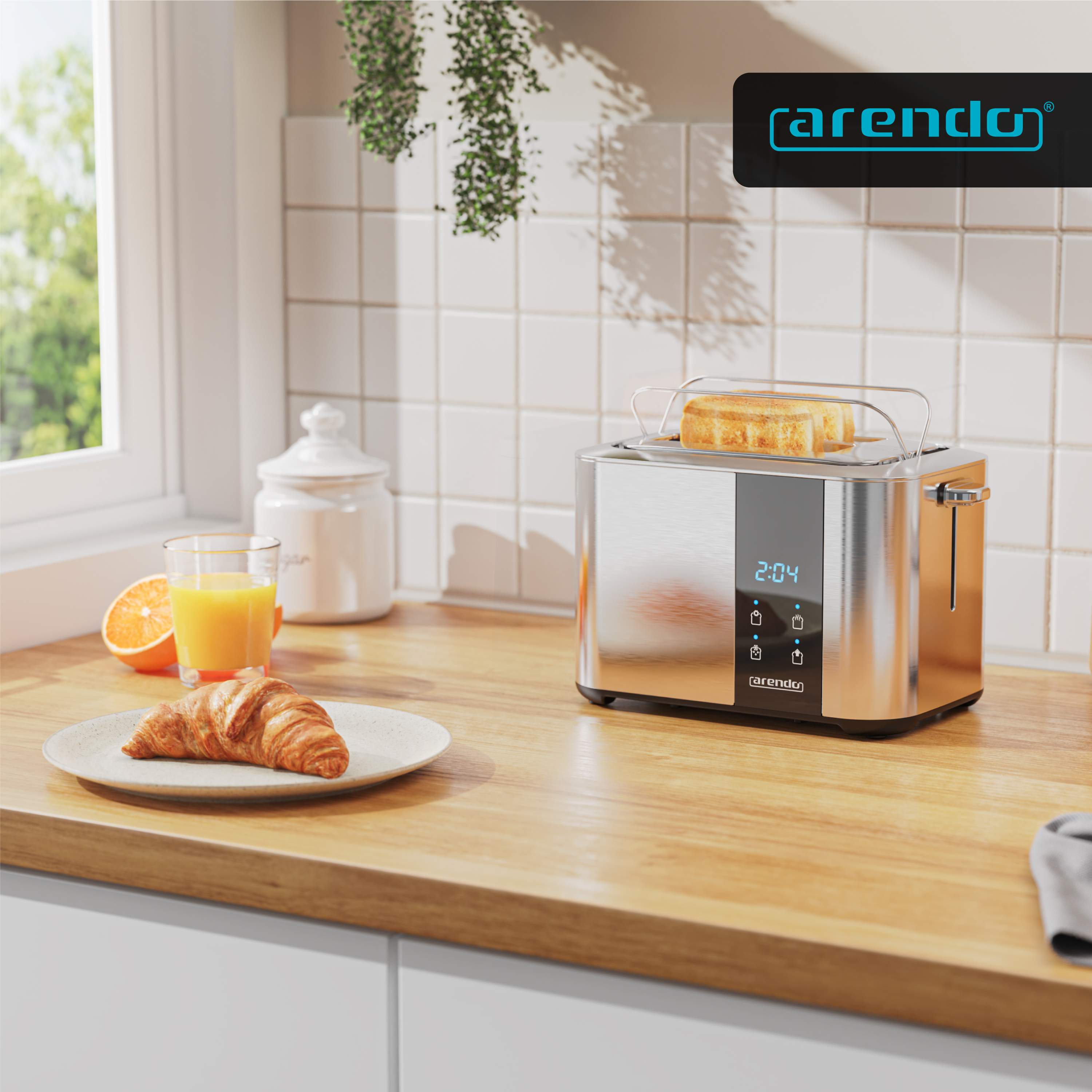 Ein silberner Toaster mit Toast, Croissant, Orangensaft und einer halben Orange.