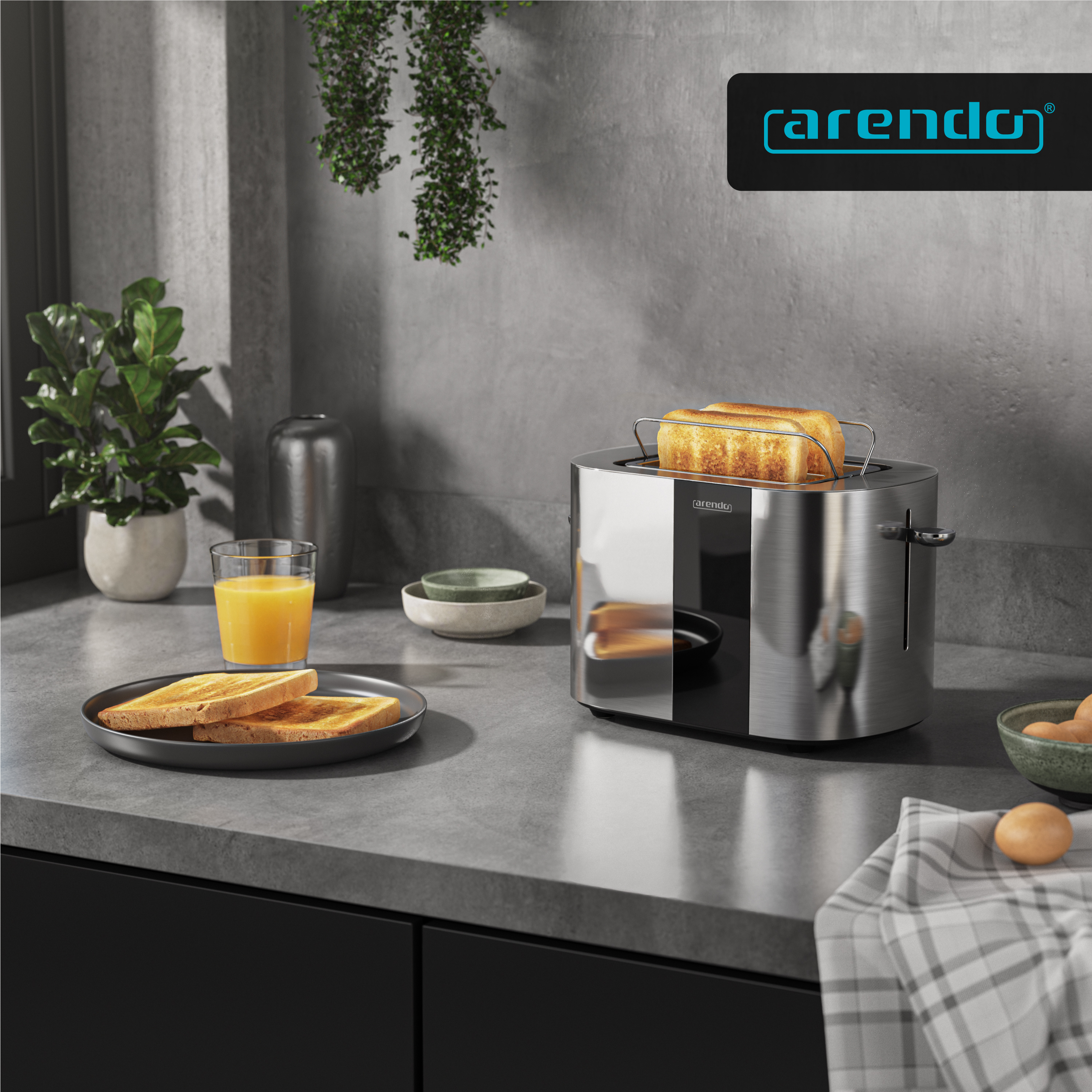 Ein silberner Toaster mit Toastbrot, daneben ein Glas Orangensaft, Teller mit Toast und Eier.