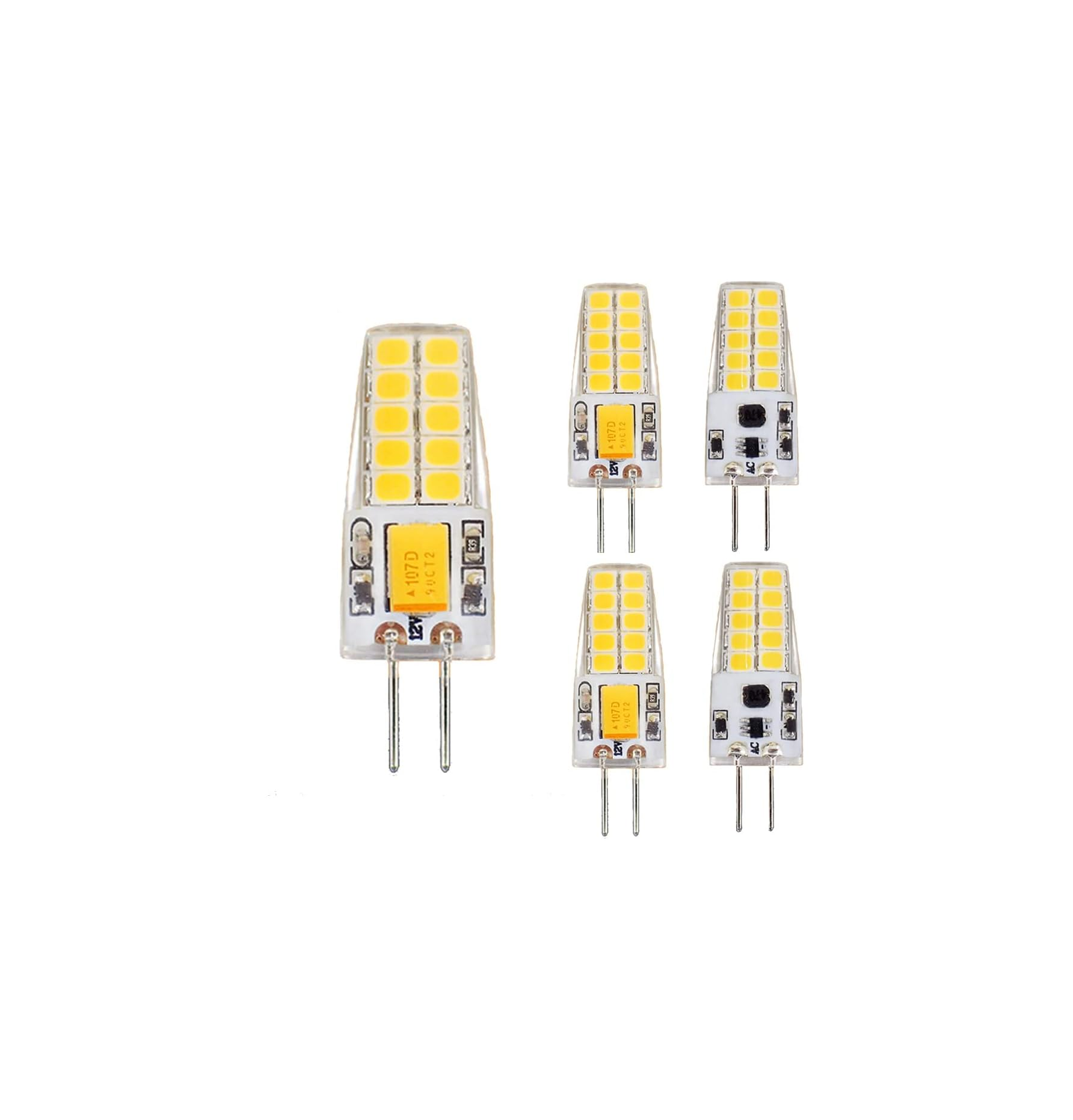 Fünf weiße LED-Lampen mit zwei Pins, auf weißem Hintergrund.