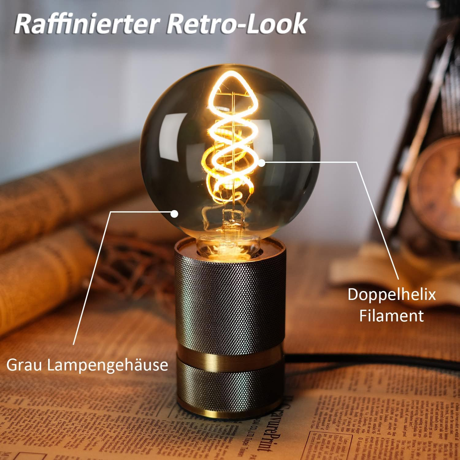Graue Lampe mit Doppelhelix-Glühfaden und Metallgehäuse.