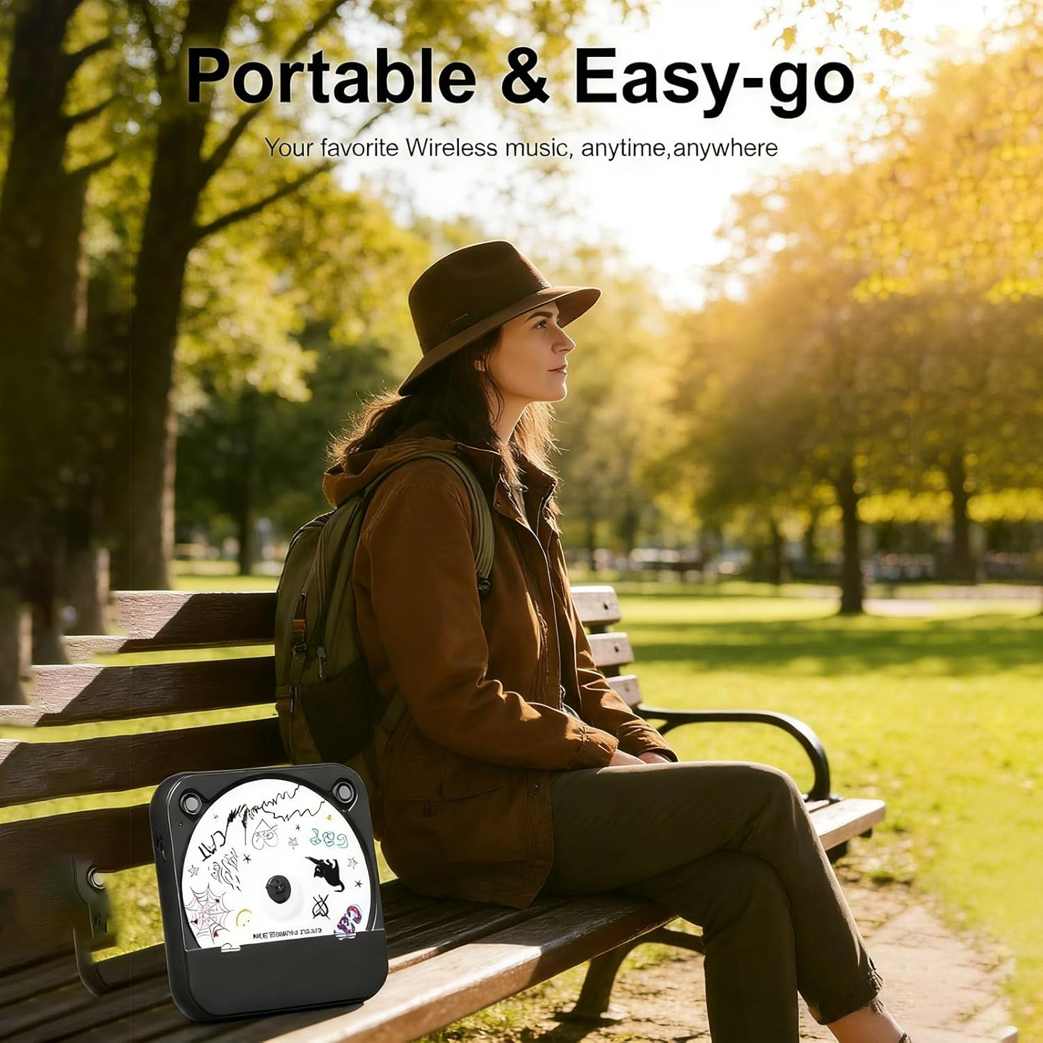 Frau mit Hut und Rucksack auf Parkbank mit tragbarem Lautsprecher und CD.