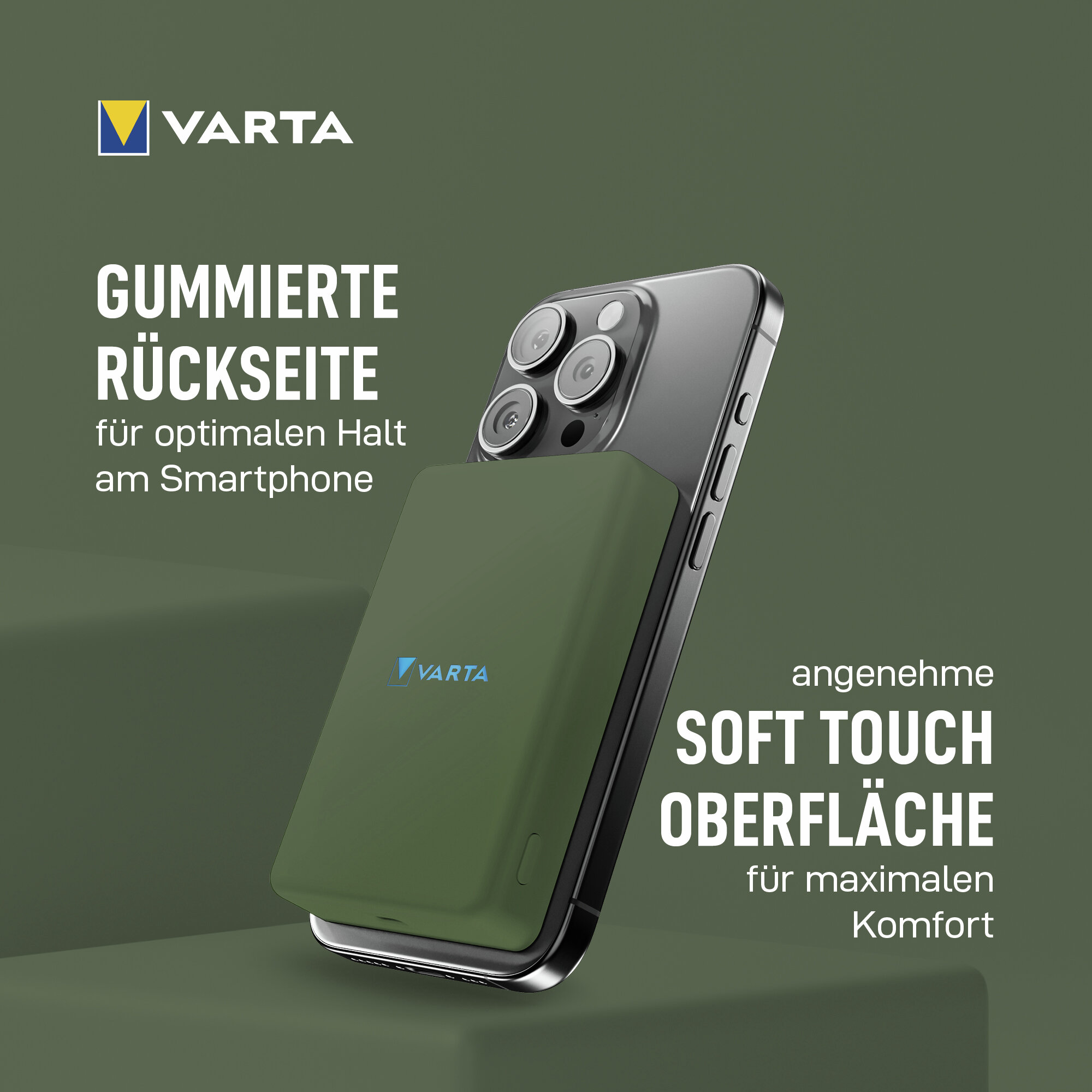 Grüne Varta Powerbank auf dunklem Smartphone. Soft-Touch-Oberfläche.