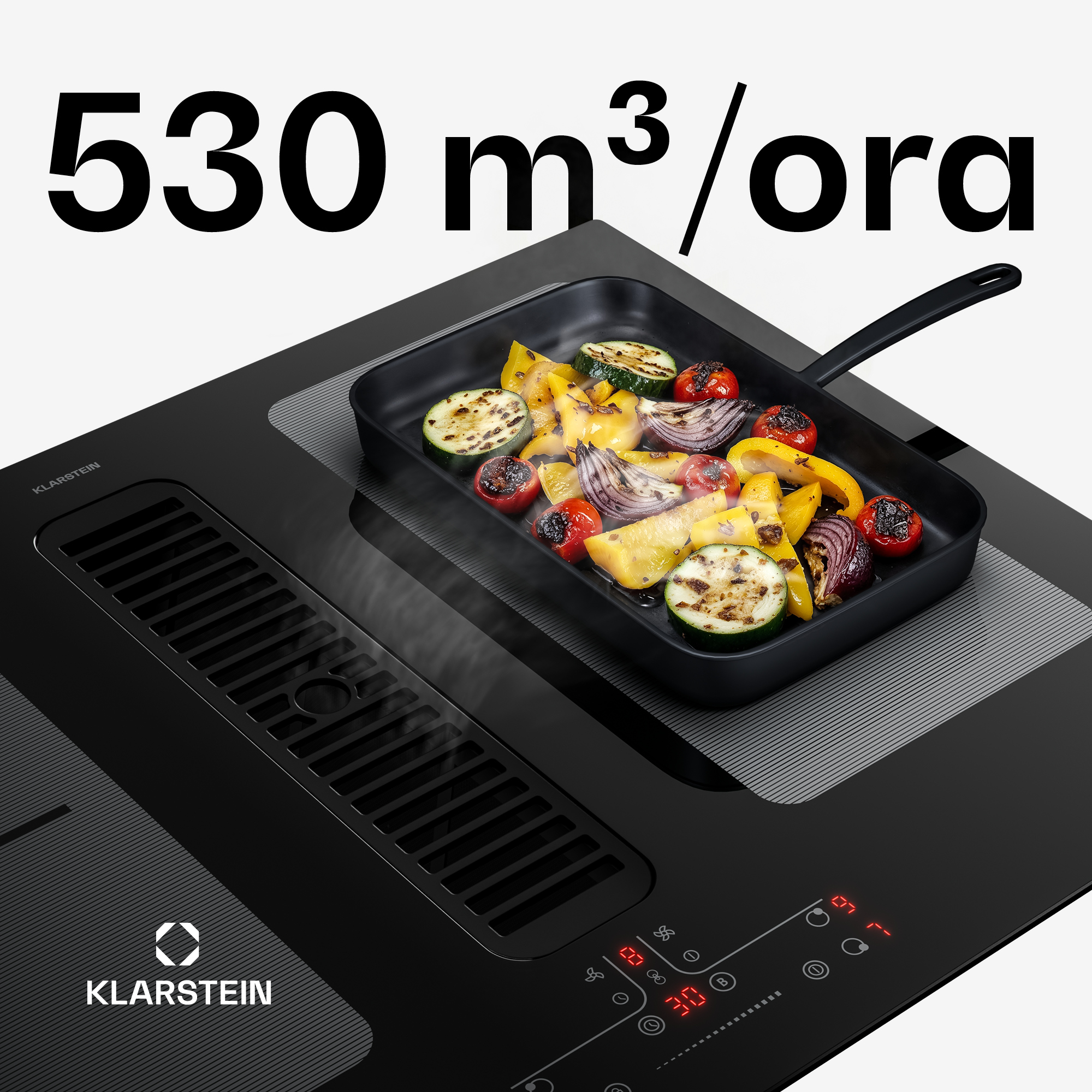 Ein Kochfeld mit Gemüse in einer Grillpfanne und der Aufschrift 530 m³/h.