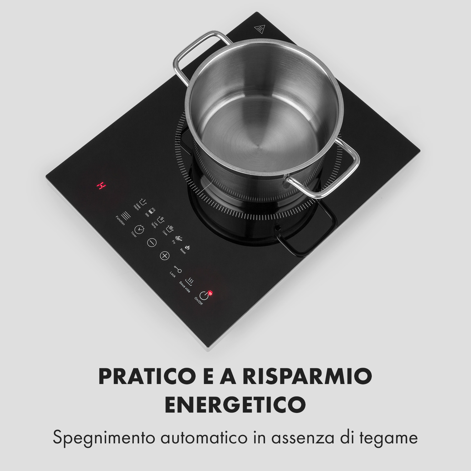 Una pentola è su un piano cottura a induzione nero con pulsanti.