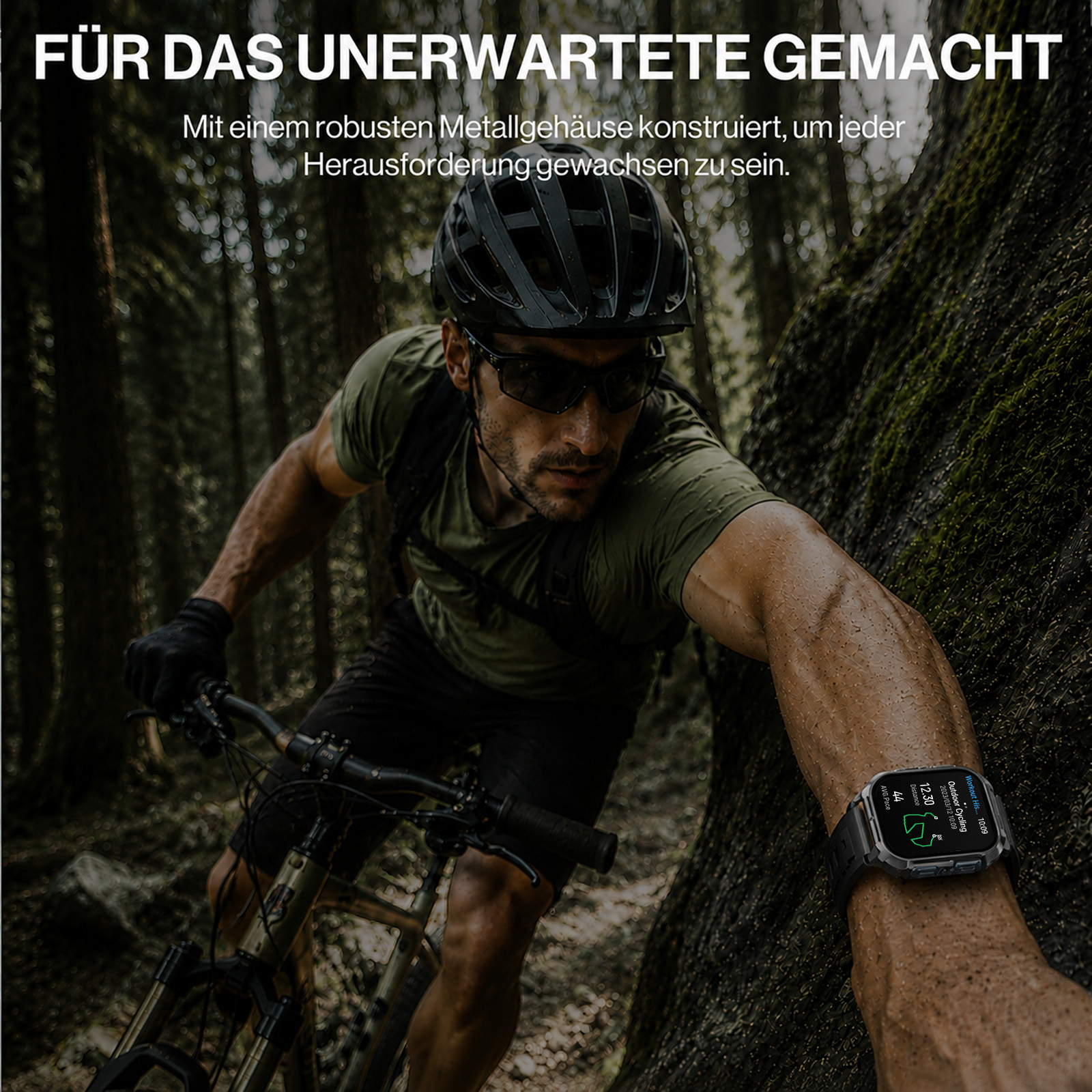 Ein Mann fährt Mountainbike im Wald. Er trägt Helm, Sonnenbrille und ein grünes Shirt.