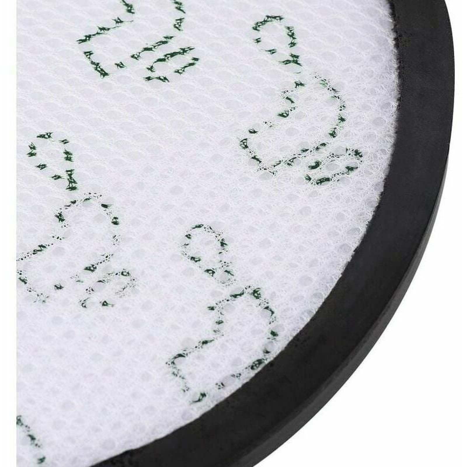 Ein weißer Filter mit grünen Linien und einem schwarzen Rand.