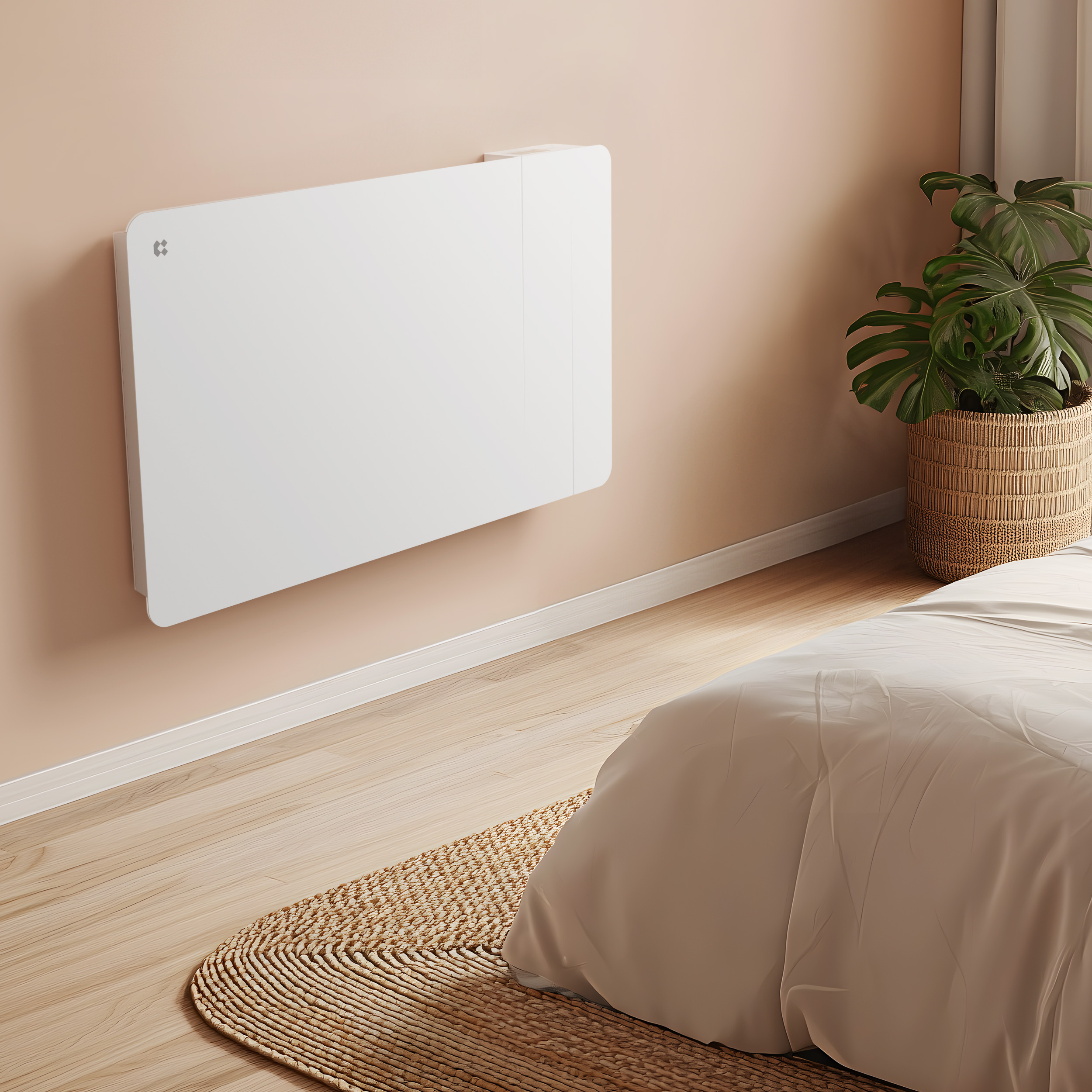 Un radiatore bianco montato a parete sopra un letto con un cesto di piante.
