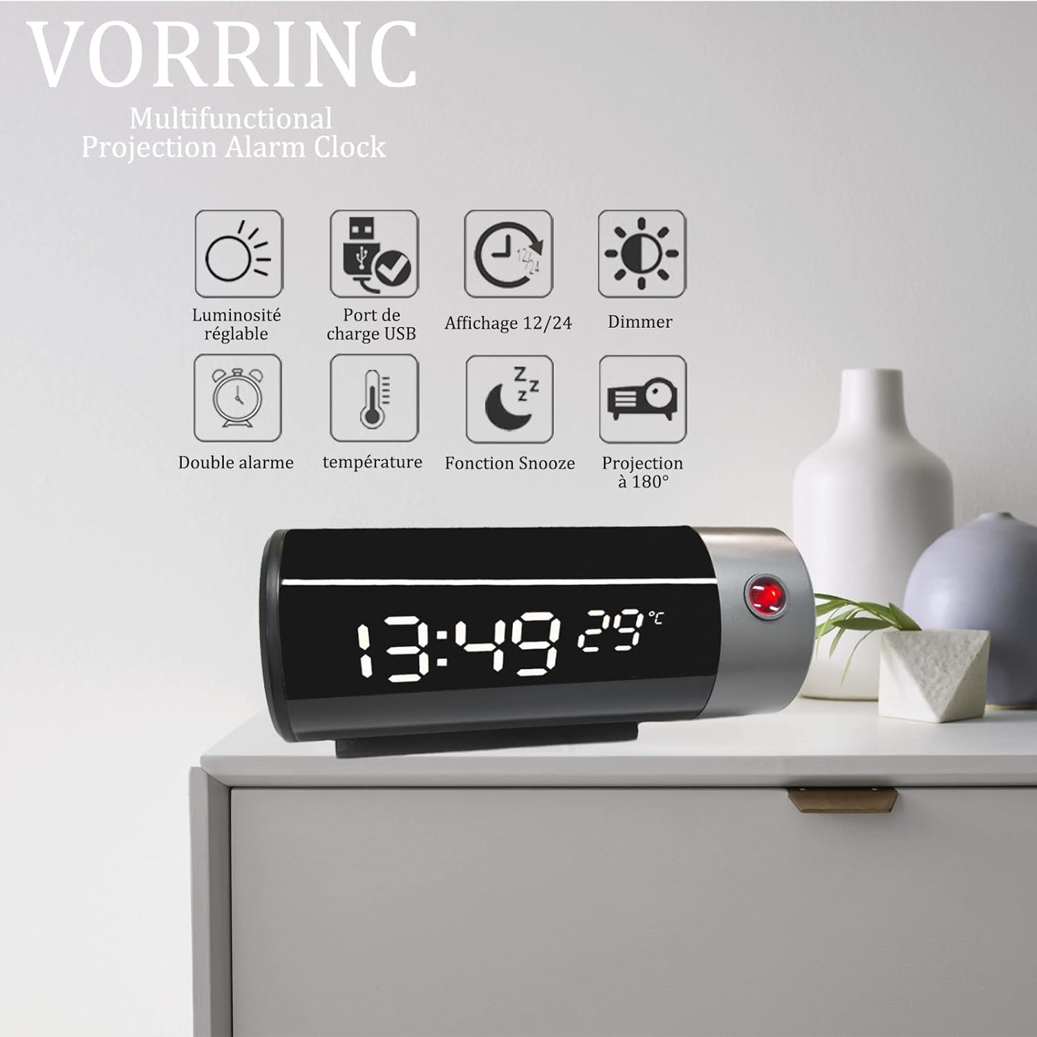 Digitaluhr mit Projektion, zeigt 13:49 und 29°C an. Funktionen aufgelistet.